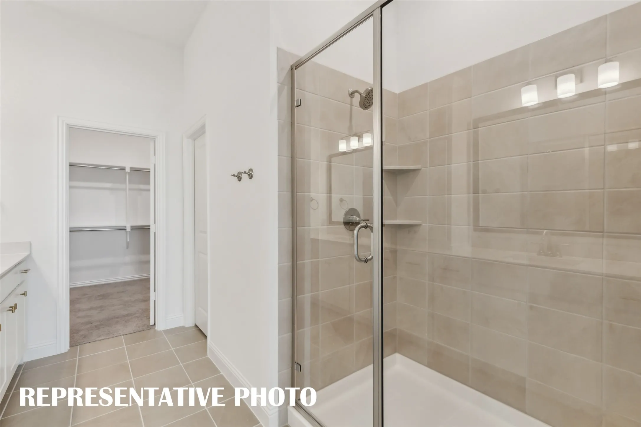 Featuring an oversized walk in shower, you'll never want to leave this beautiful owner's bath!