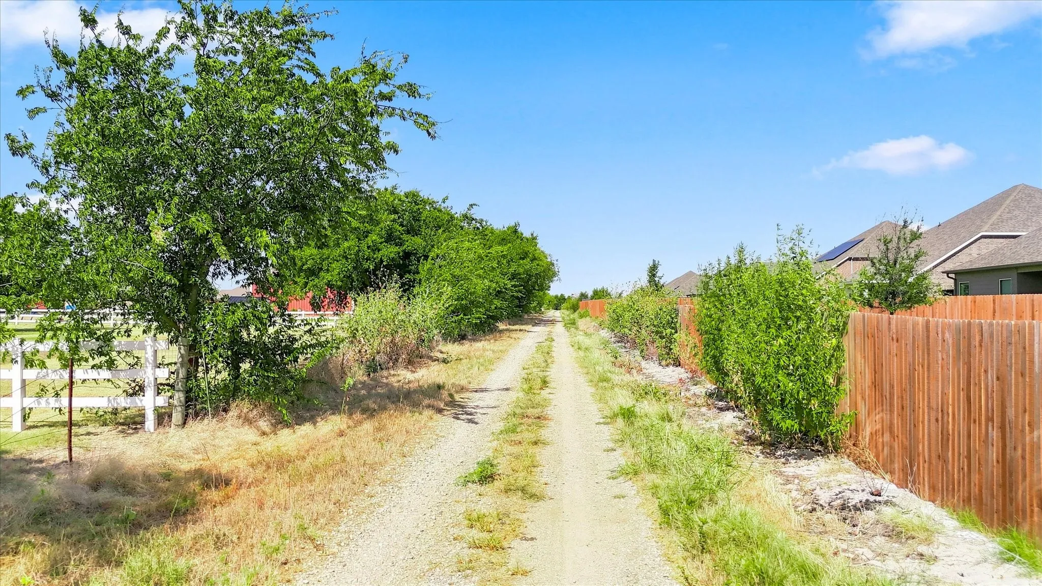 This rarely used road backs to the home allowing for no actual backyard neighbors.