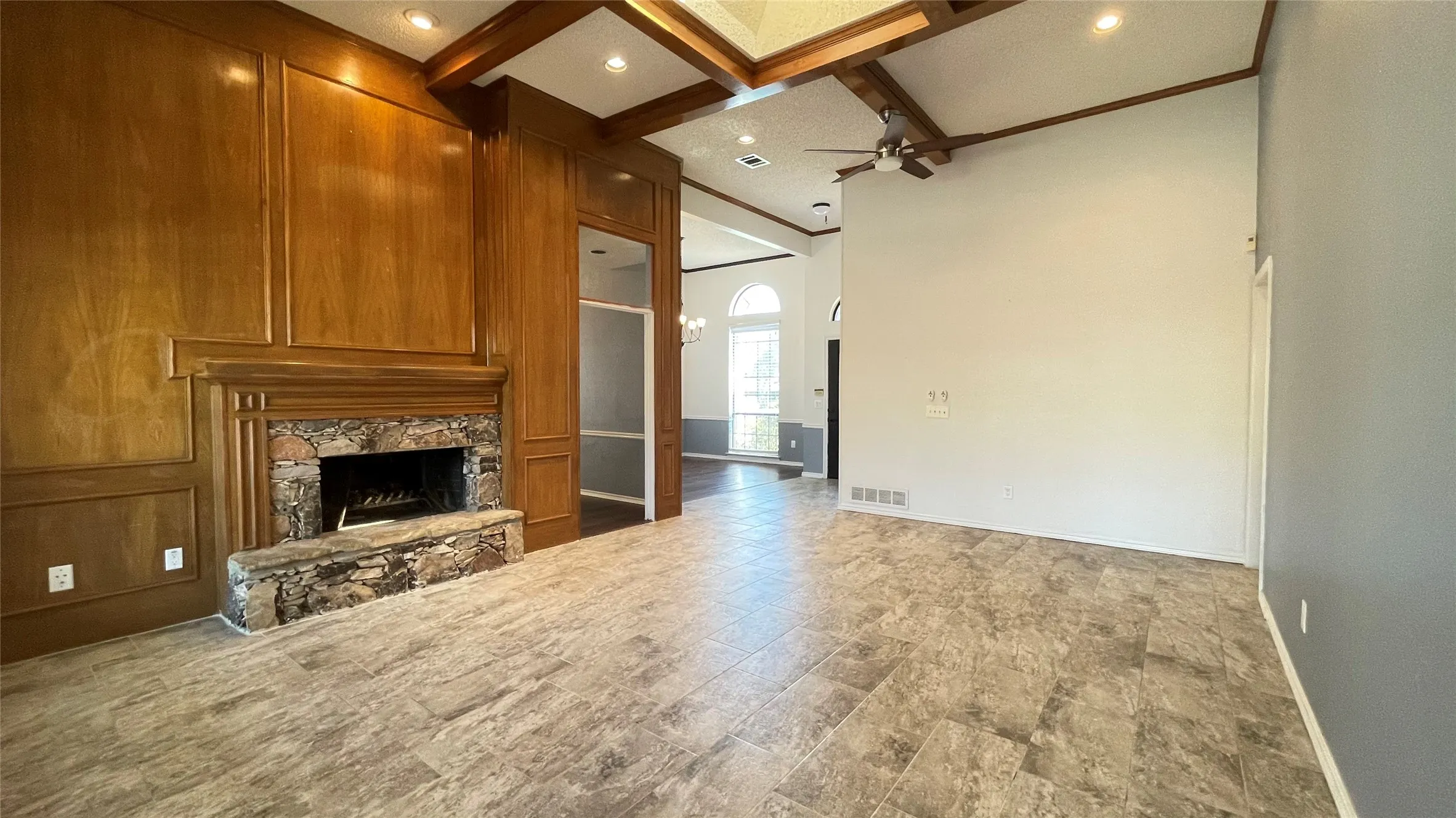 High ceiling with cross wood beams
