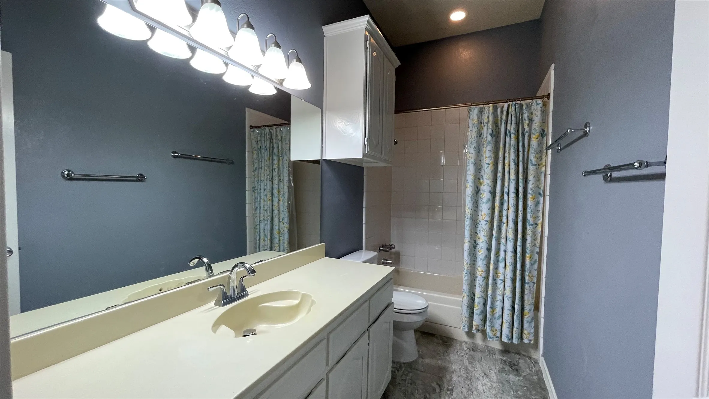 Hall bath with rectangular tile floor