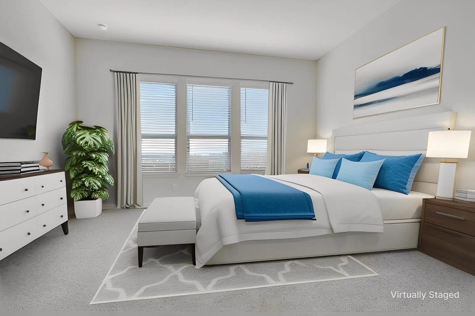 The spacious primary bedroom on the first floor features backyard views and a HUGE walk-in closet!