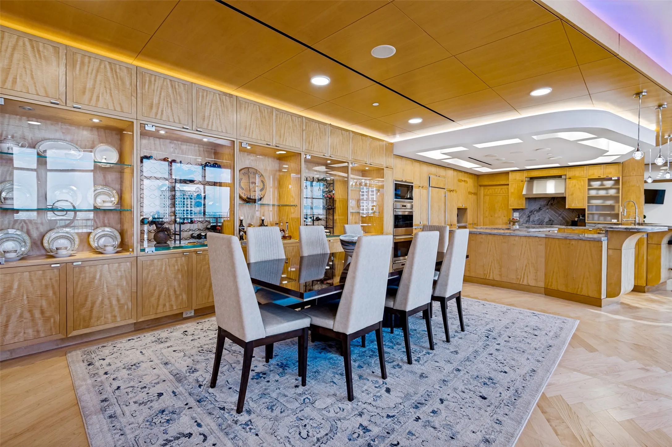 Wood-finish cabinetry and ceiling panels