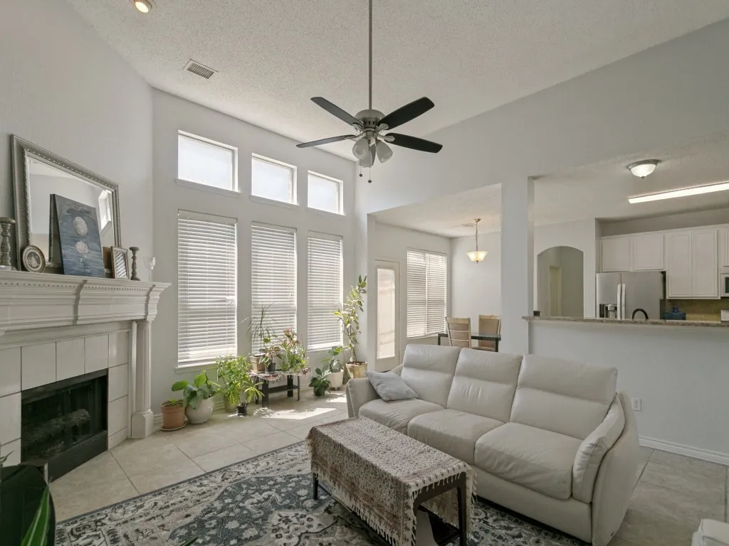 Vaulted ceilings complement the tile flooring throughout the living space