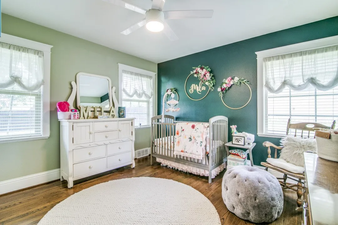Hardwood flooring complements the two-tone wall treatment