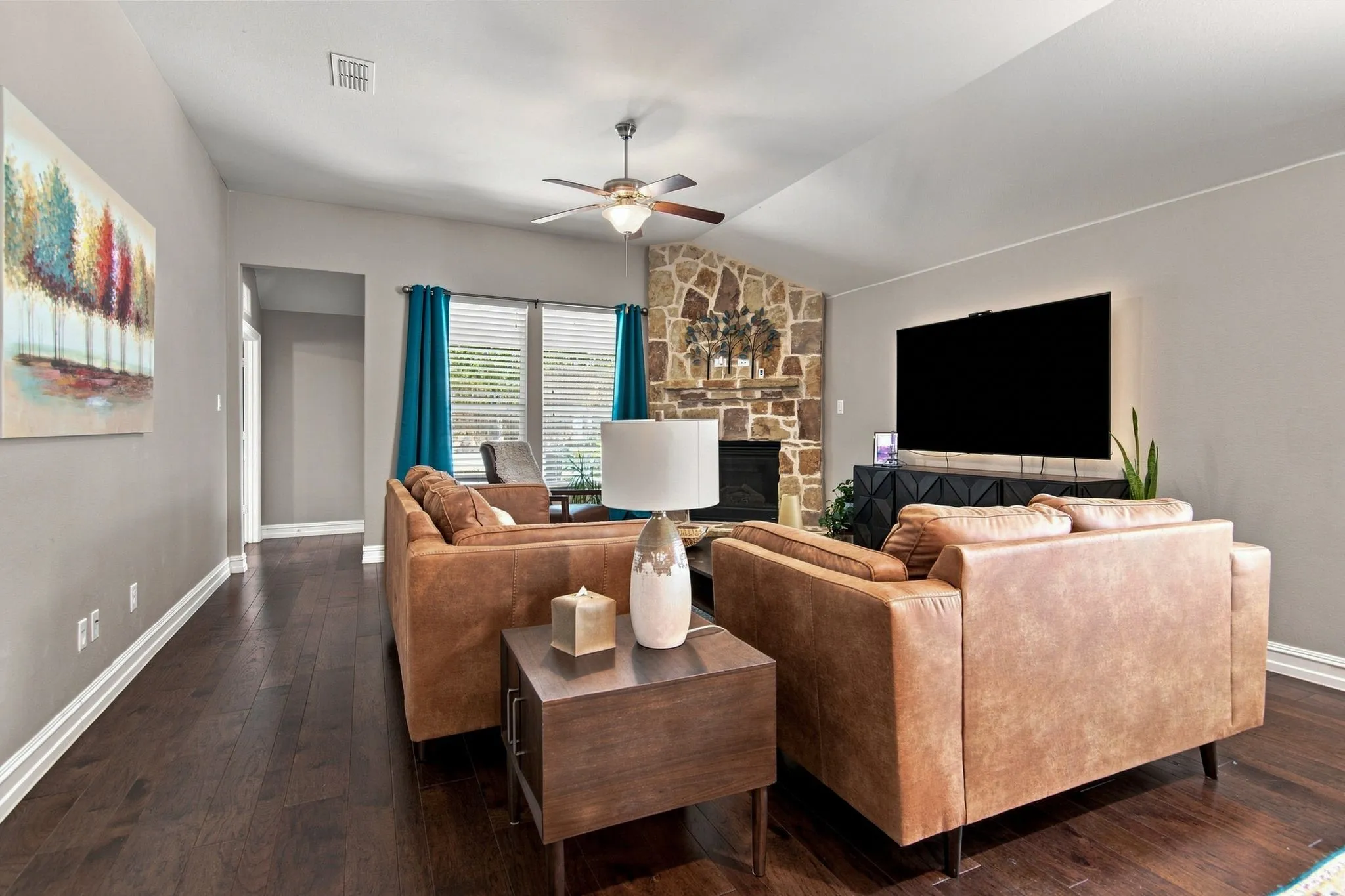 Living area with accent corner fireplace