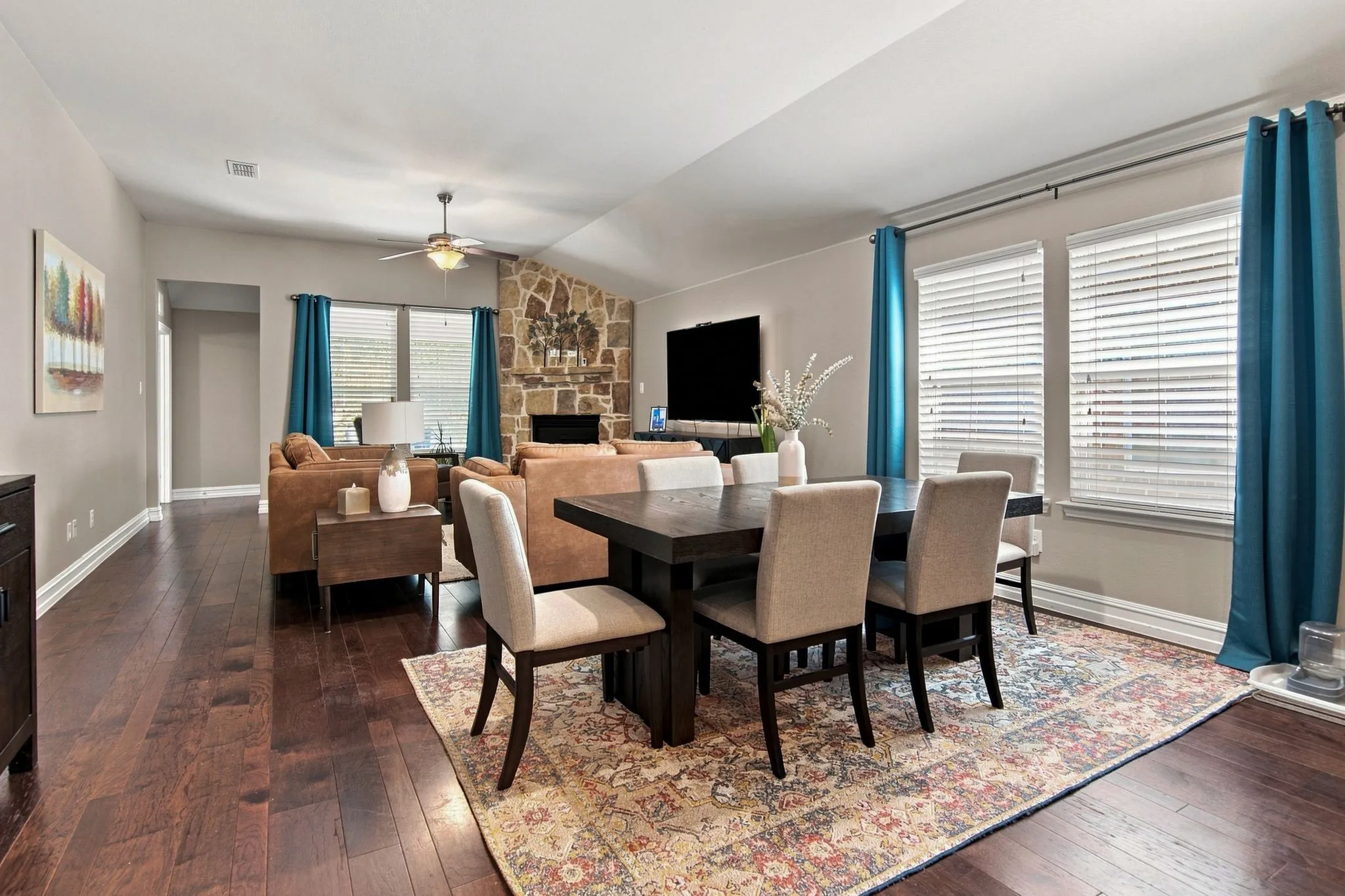 In addition to the extra seating at the island... you still have plenty of room for a nice size dining table!