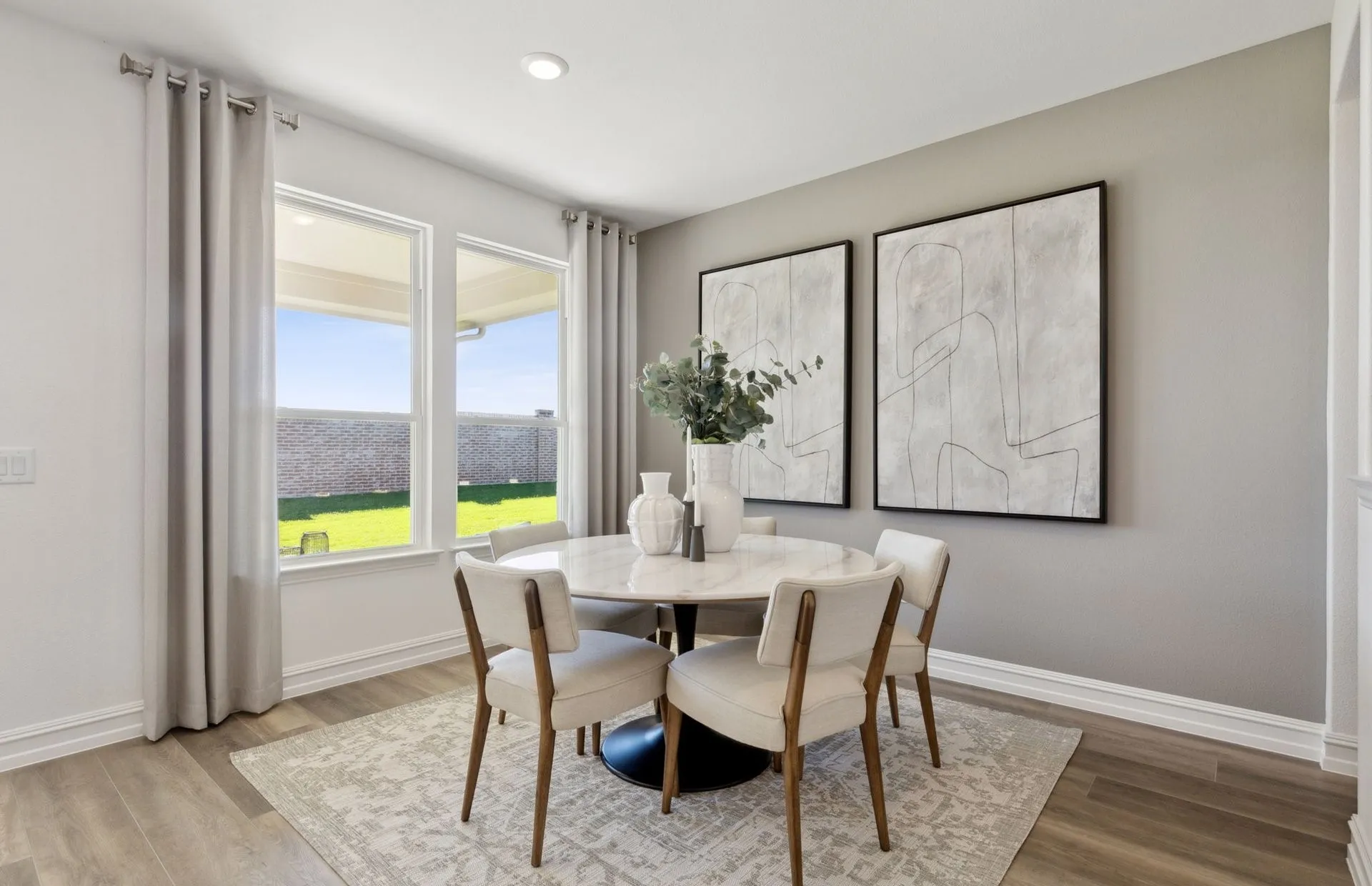 *Model Representation - Dining area off kitchen with large windows