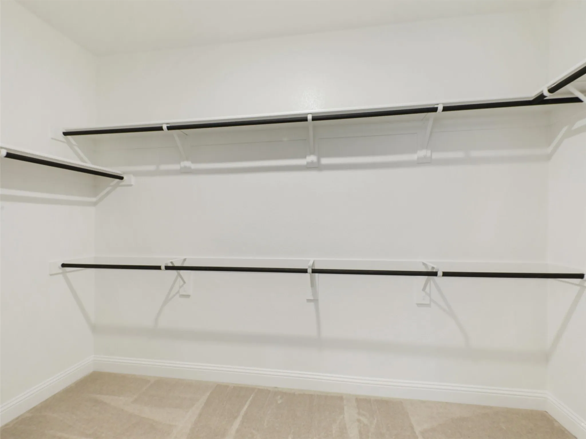 Built-in closet shelving and hanging rods