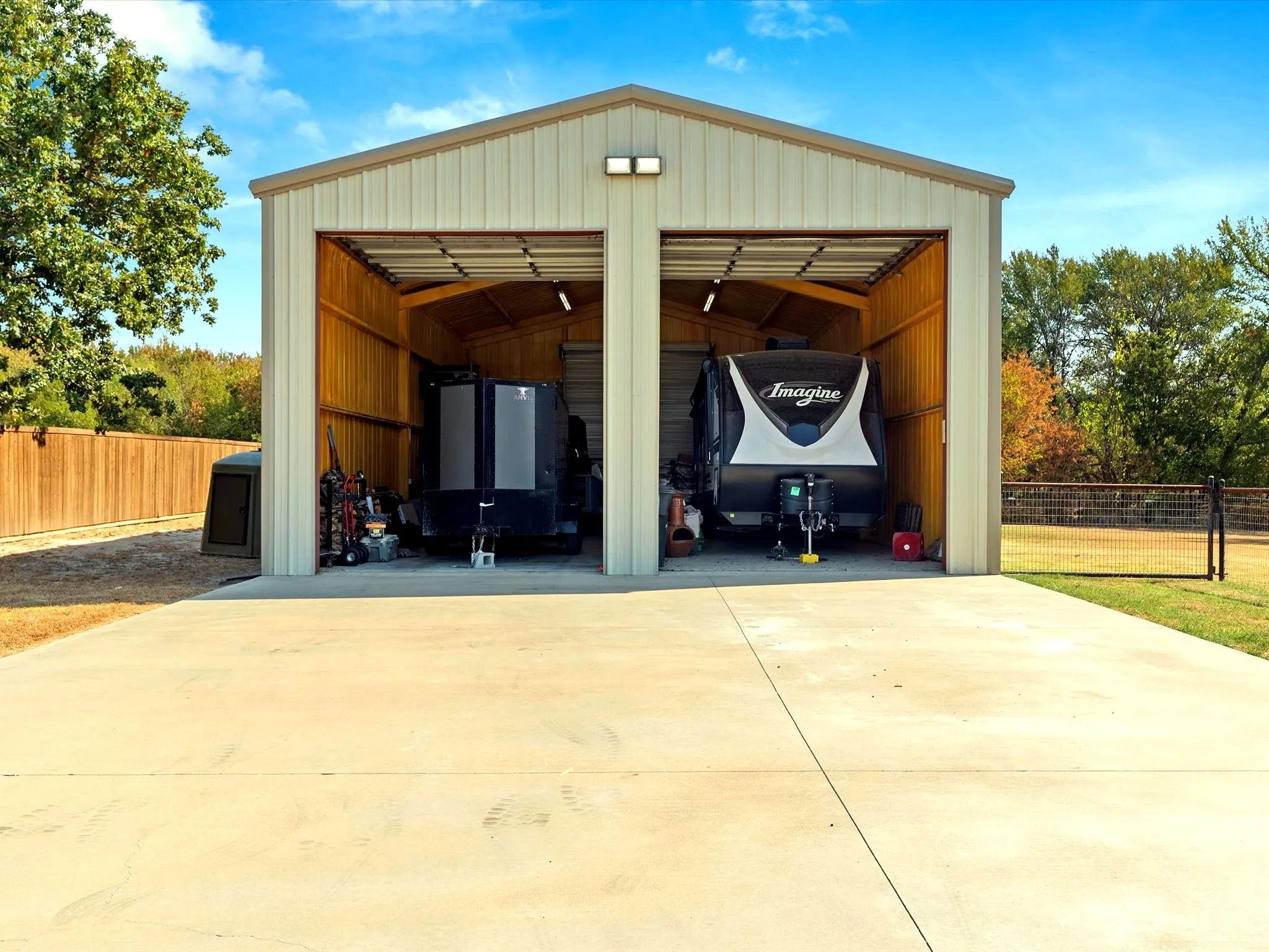 30x50, 12x14 garage doors (2 front, 1 back), insulated w/ electricity
