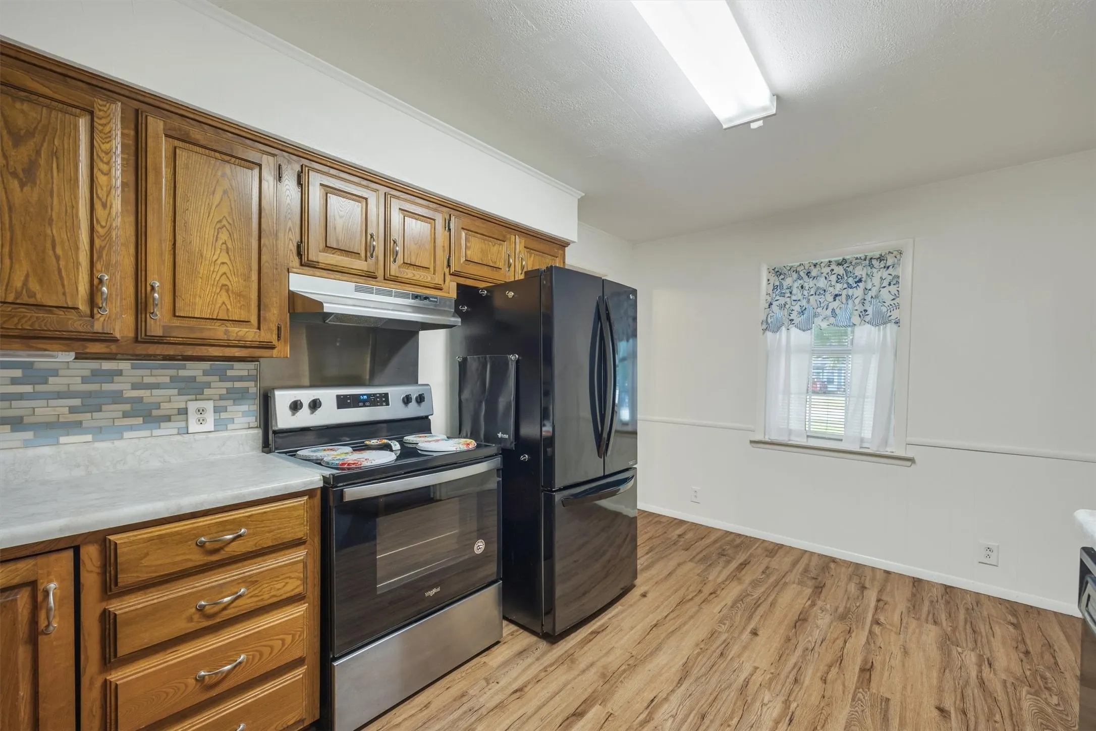 Area for small kitchen table by the window.