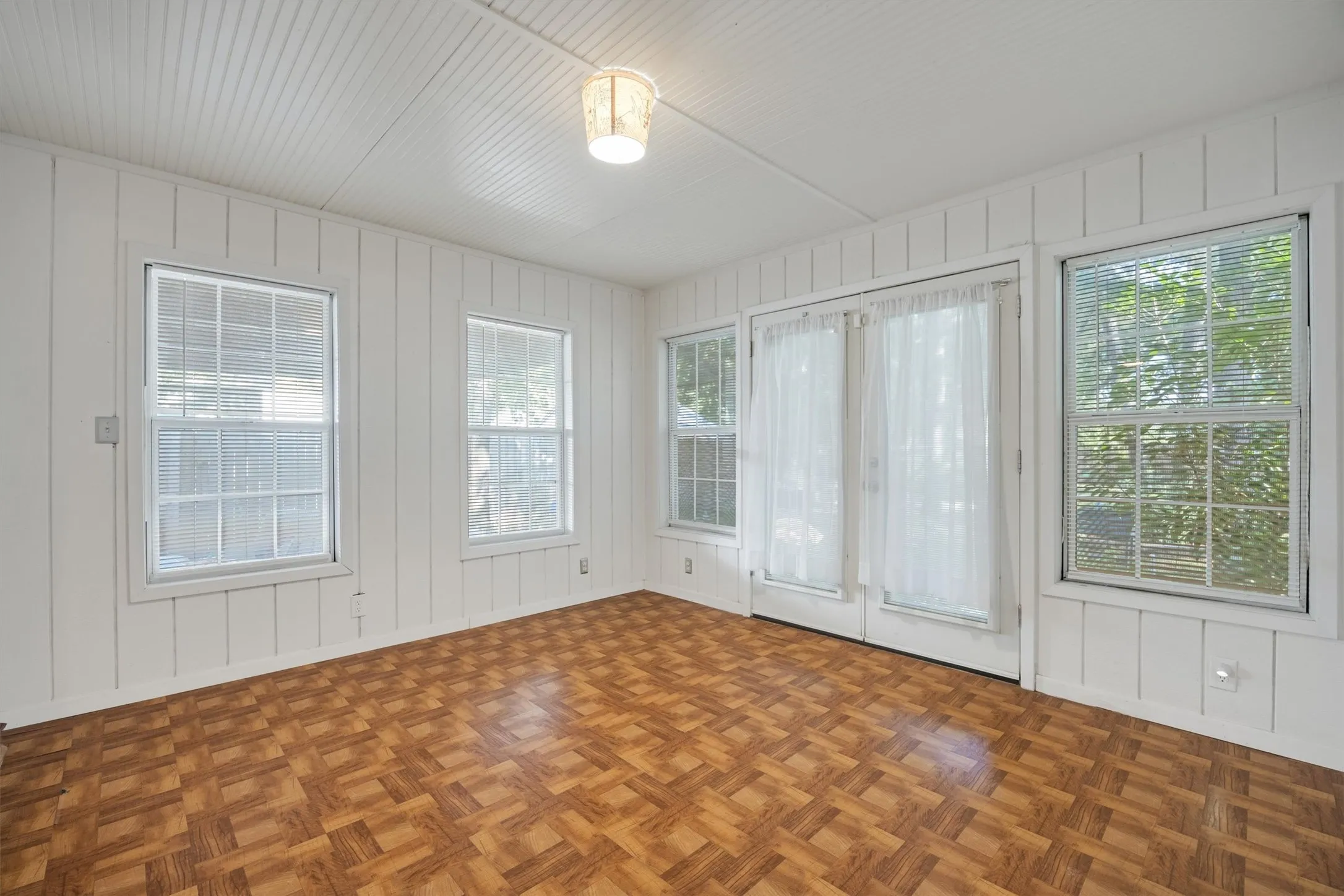 French doors to back yard.