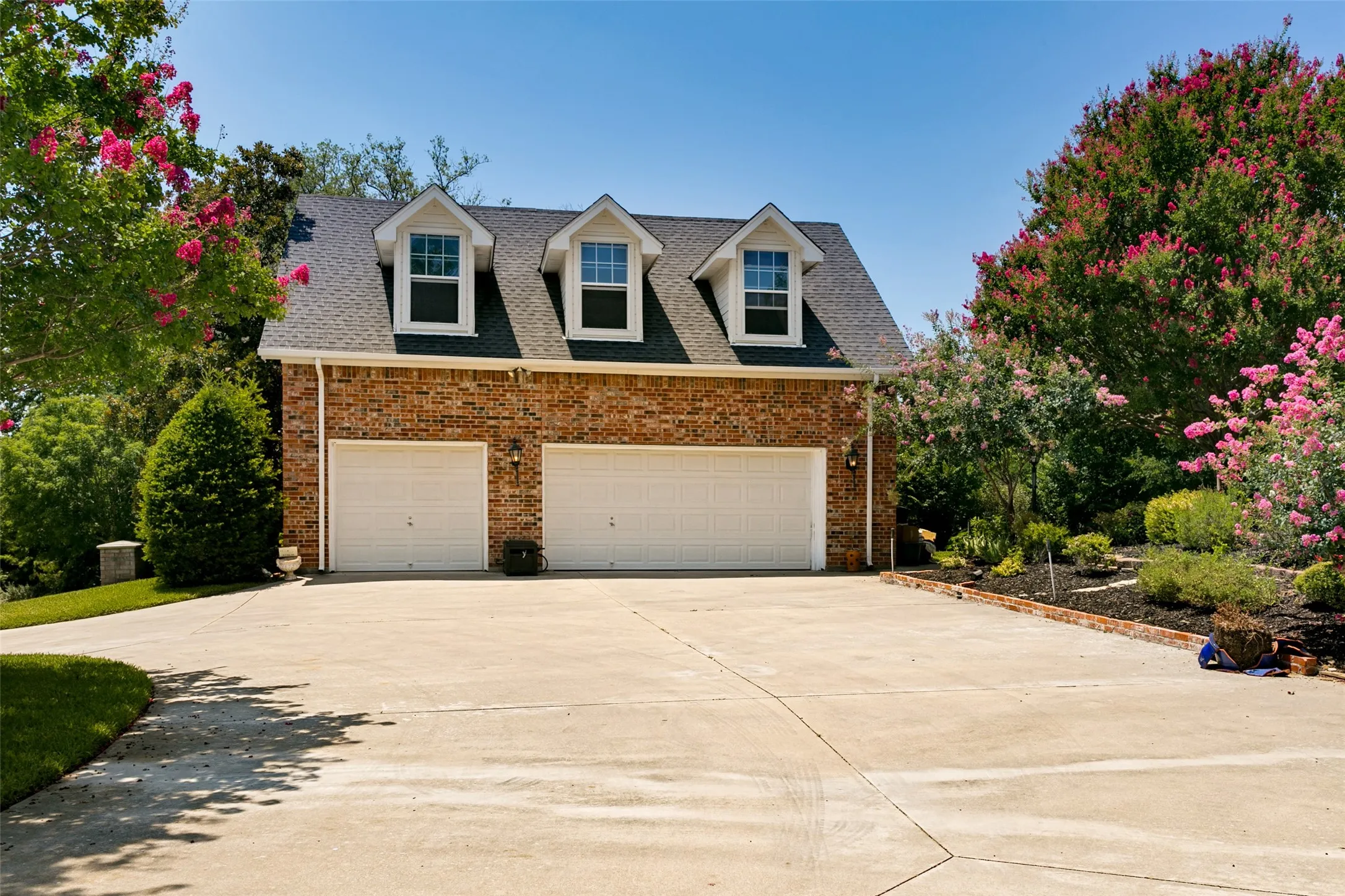 3 car garage with additional unfinished attic space