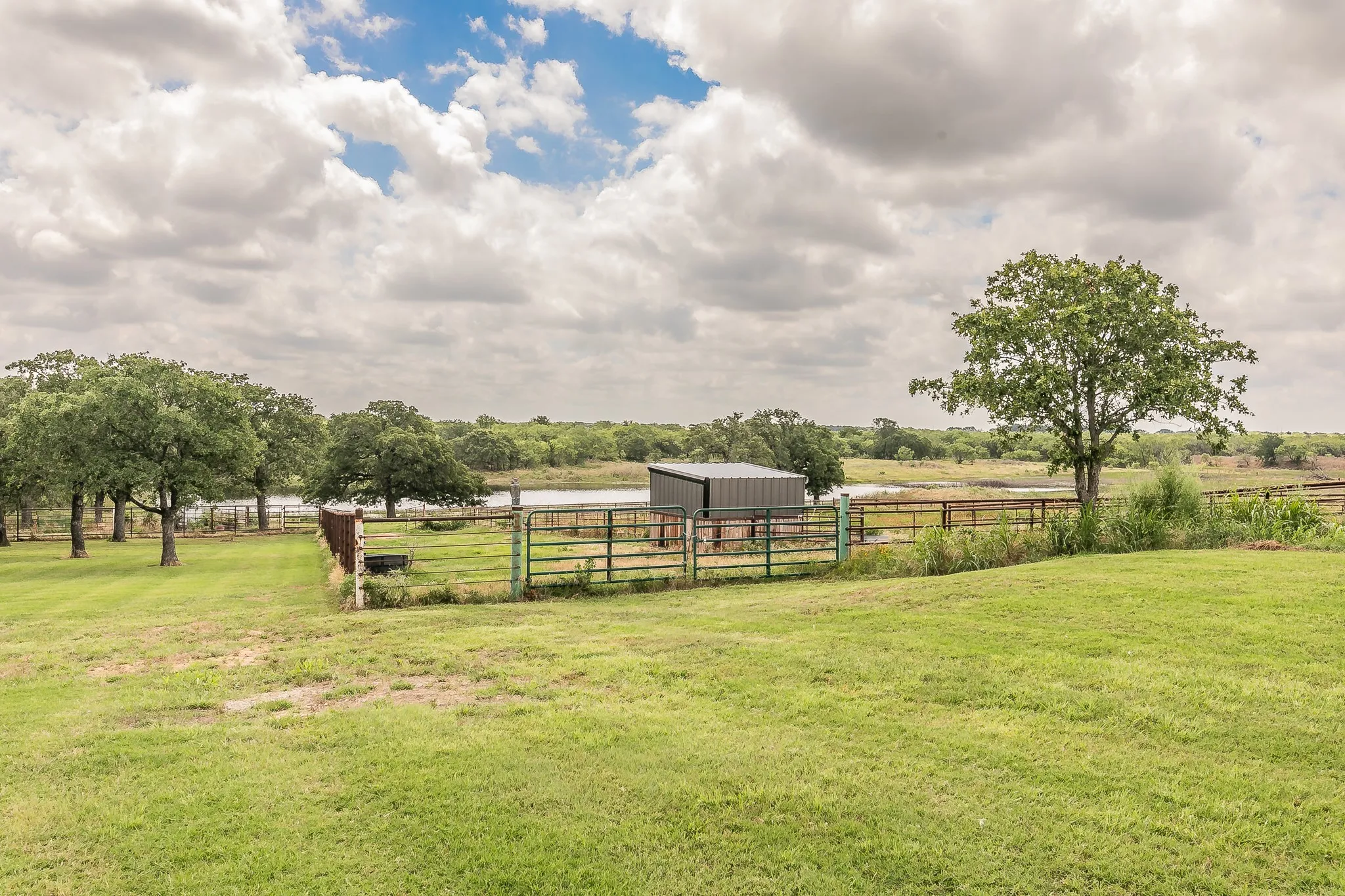 View of yard featuring an outdoor structure and a rural view