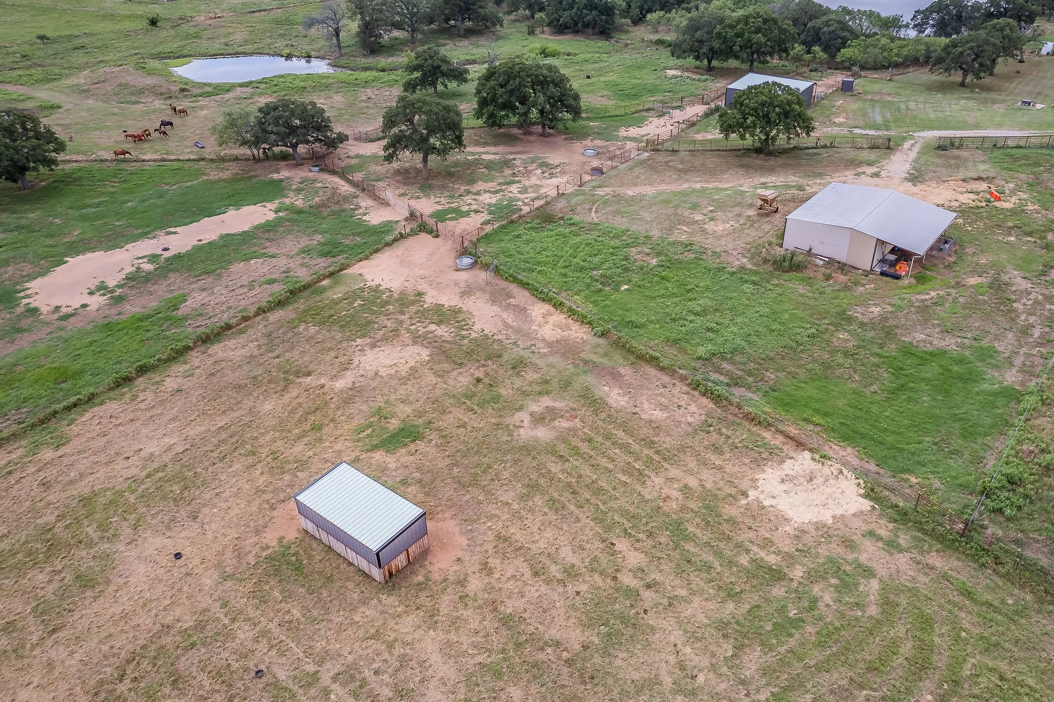 Bird's eye view with a water view and a rural view