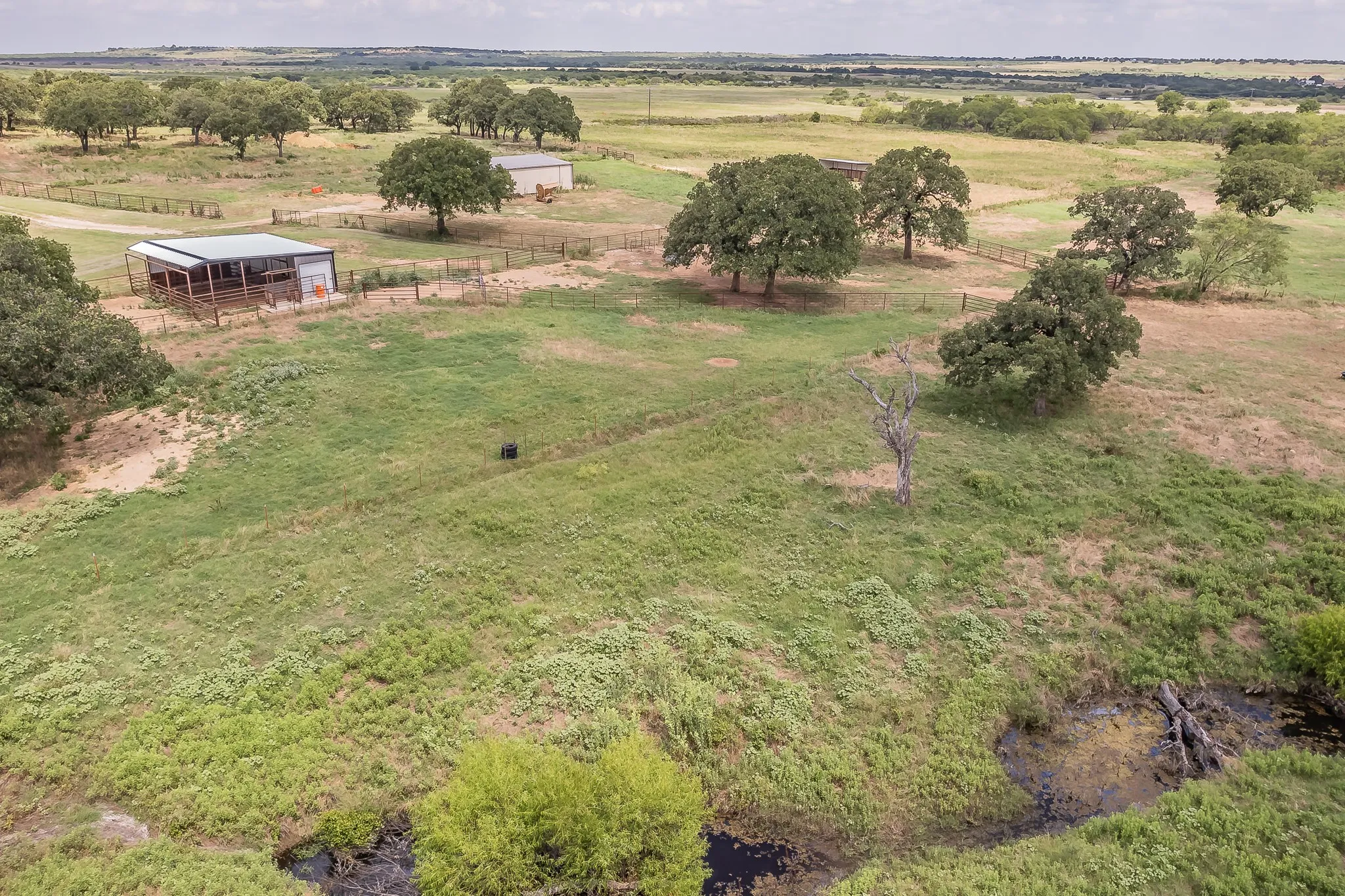 Birds eye view of property featuring a rural view