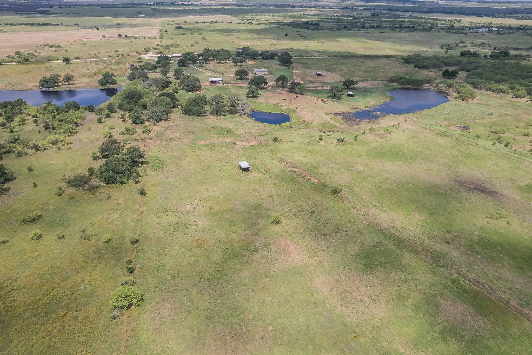Drone / aerial view with a rural view and a water view