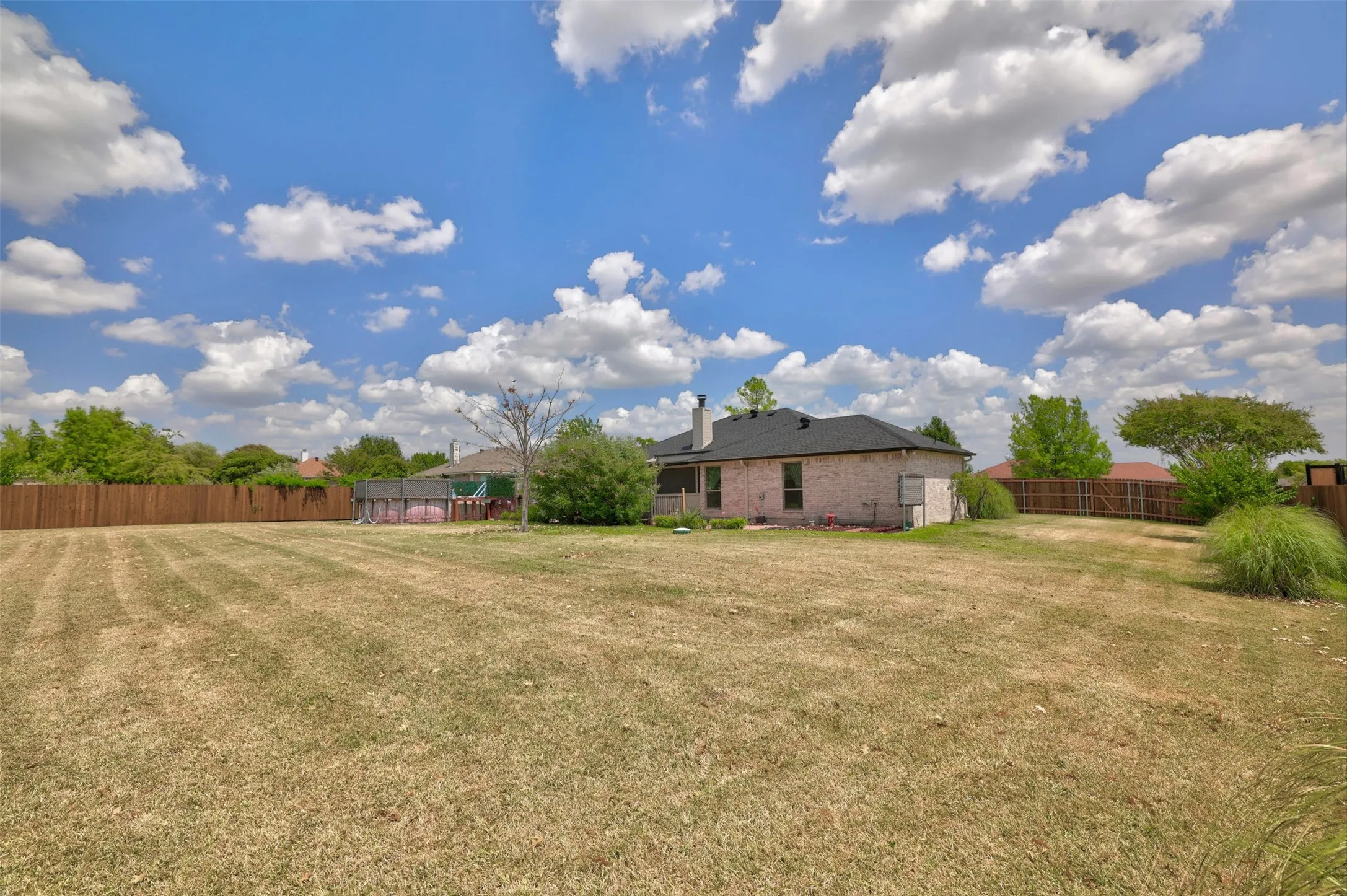 .5 acres to run, play, plant, or do whatever makes you happy