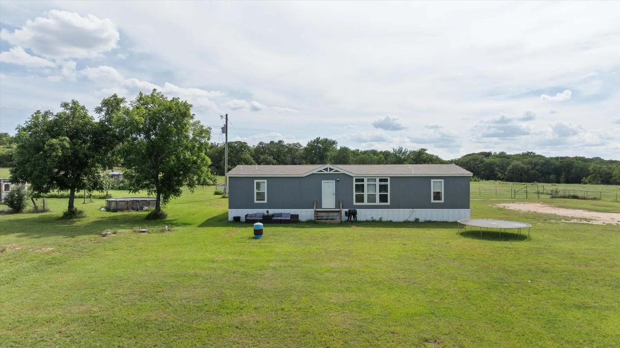 Mobile Home For Sale in Erath County , 7150B County Road 236, Hico, Texas 76457, 3 Bedroom, 3 Bathroom, Garage spaces, 1,920 Sqft, built in 2023, mls#21355338, Real Estate Agent in Hico, Homes For Sale in Erath county, Homes For Sale in Hico, Realtor in Hico Texas, Real Estate Brokerage Independent Realty Texas, Luminita Cordes Realtor