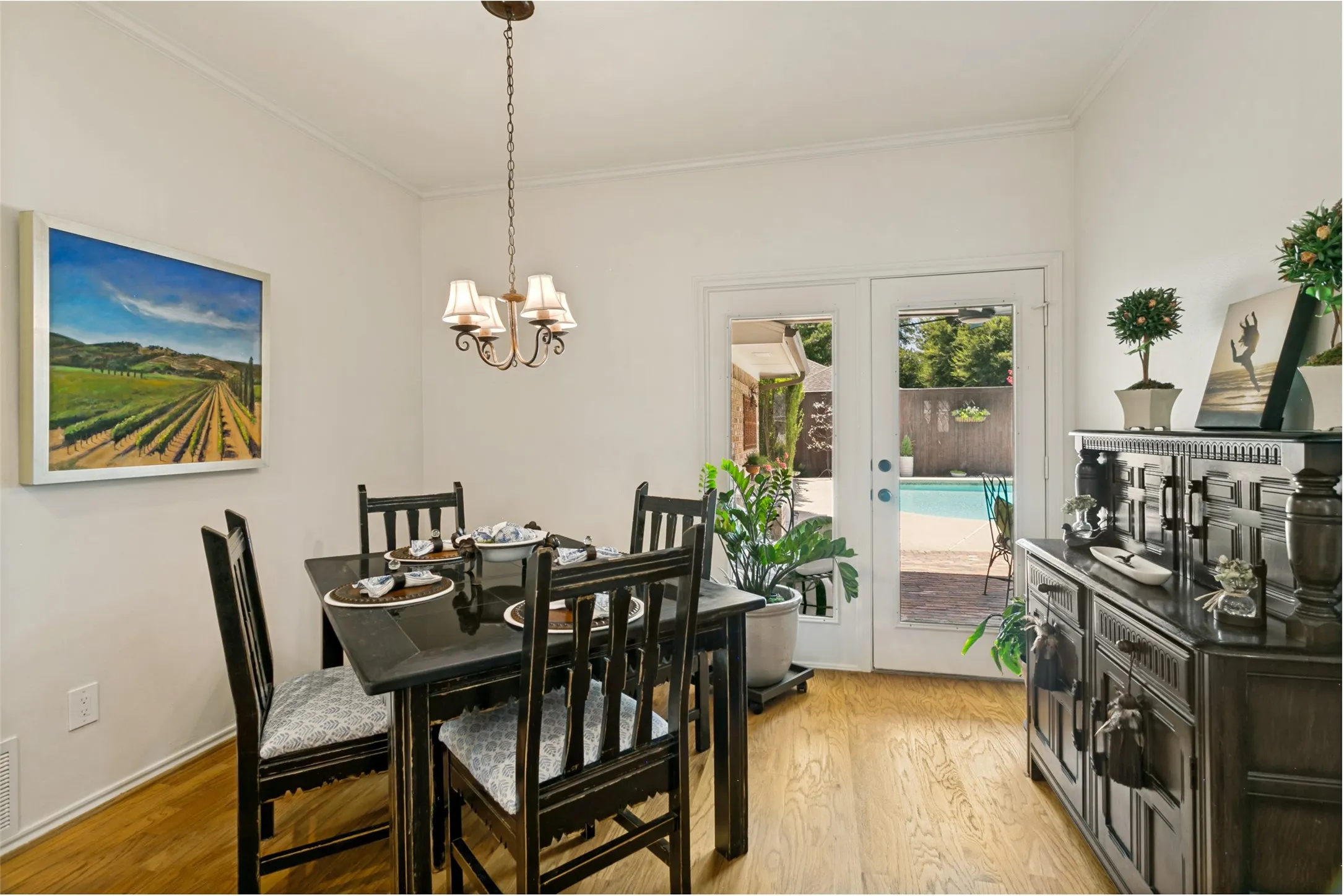 Breakfast area overlooks the patio and pool.