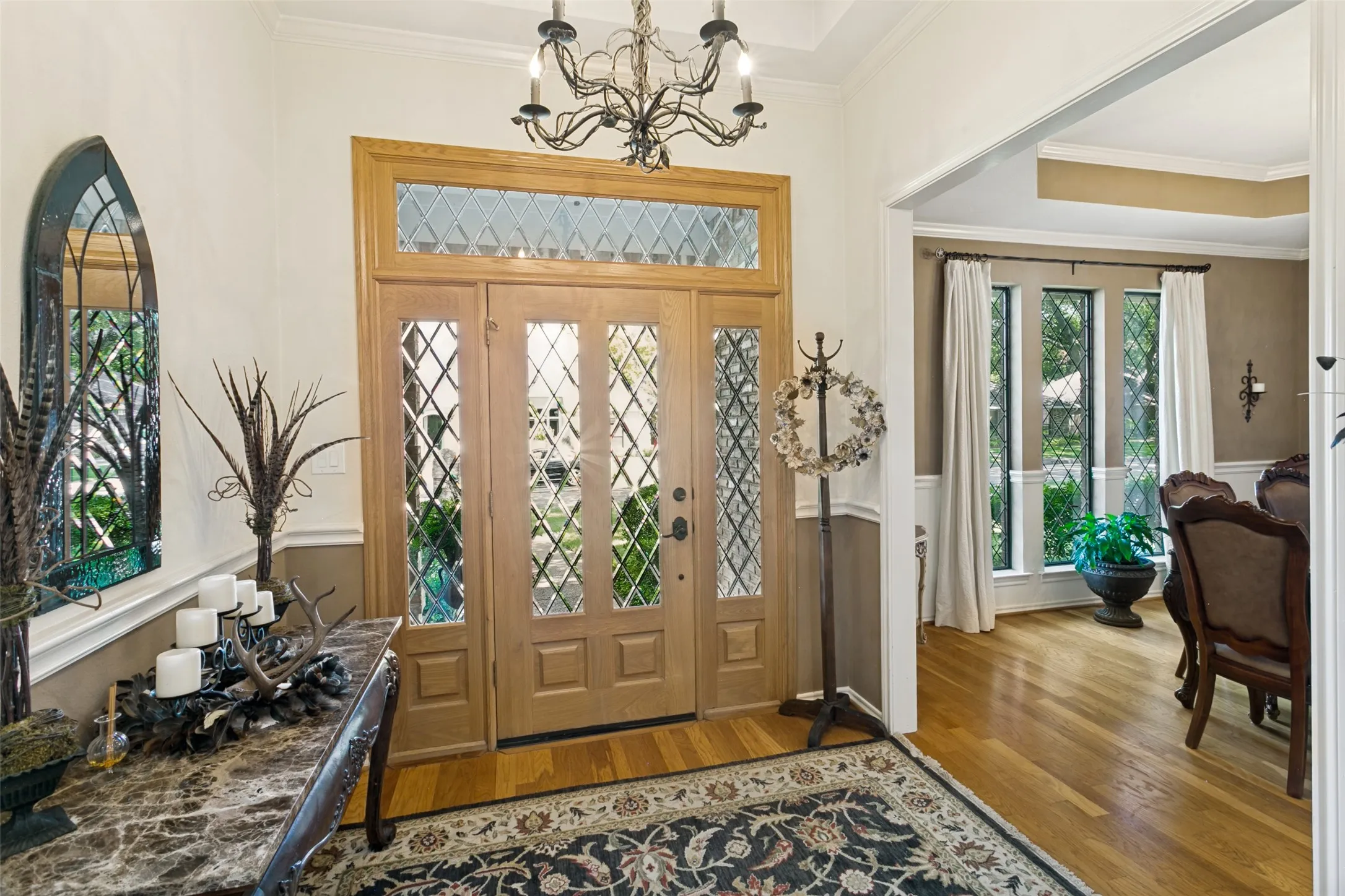 Distinctive leaded glass windows distinguish this home's entrance.