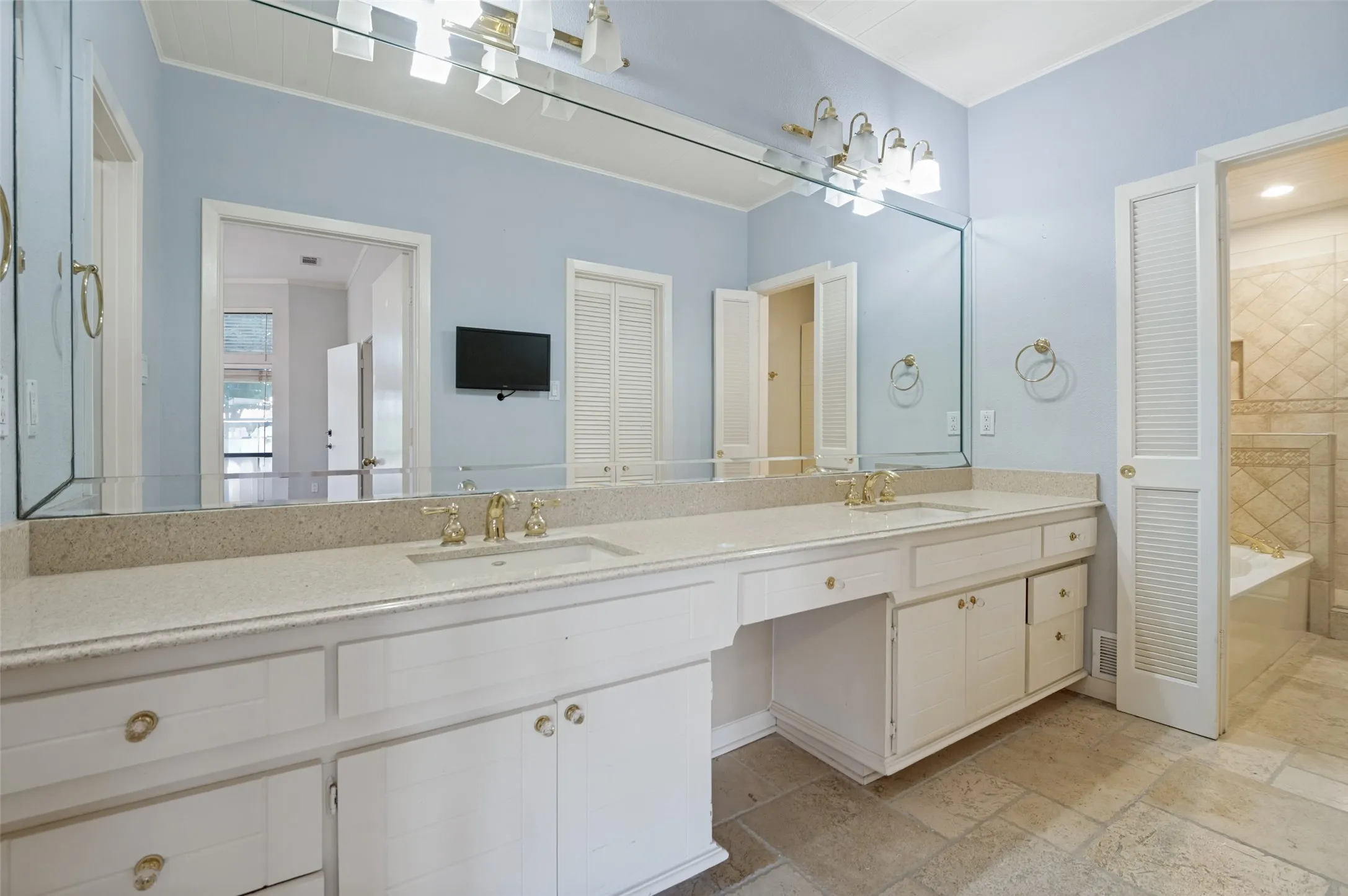 Downstairs Primary Bath with double sinks.