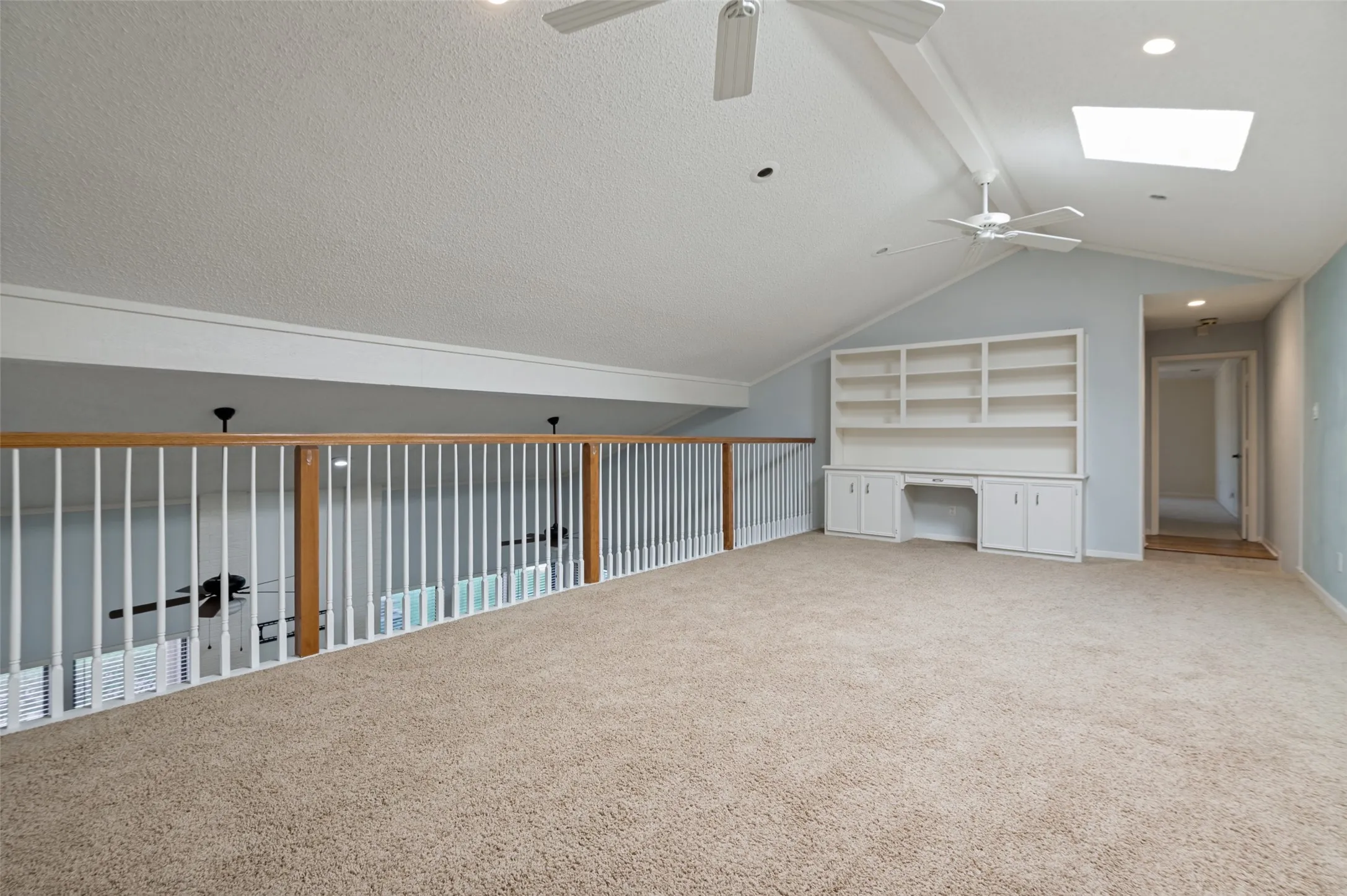 Open Gameroom with views to downstairs living.