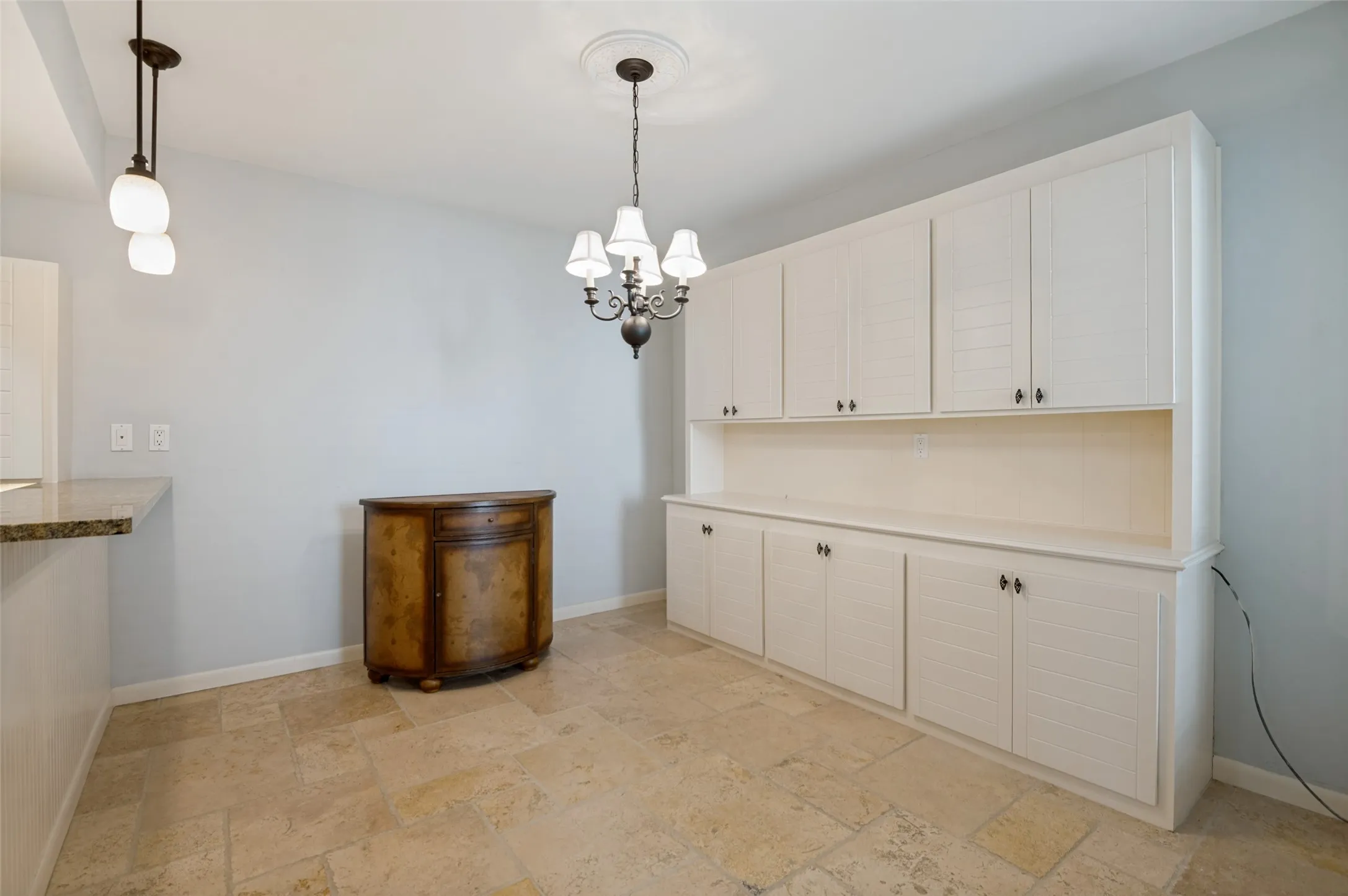 Granite Breakfast Bar and wonderful builtins.