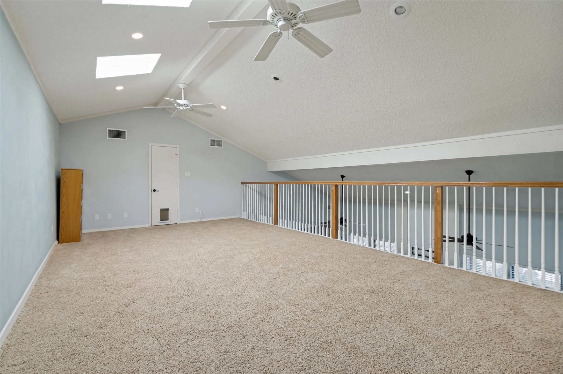 Another view of huge gameroom. Skylights and huge stg. closet.