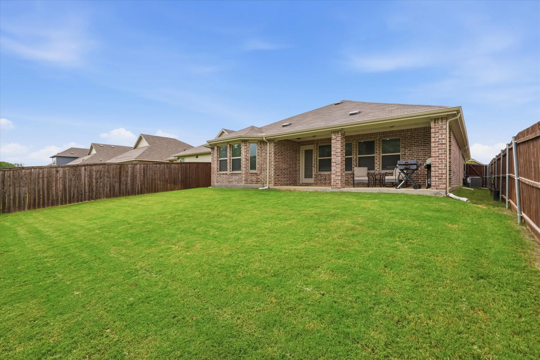 There's plenty of yard and a nice extended covered patio.