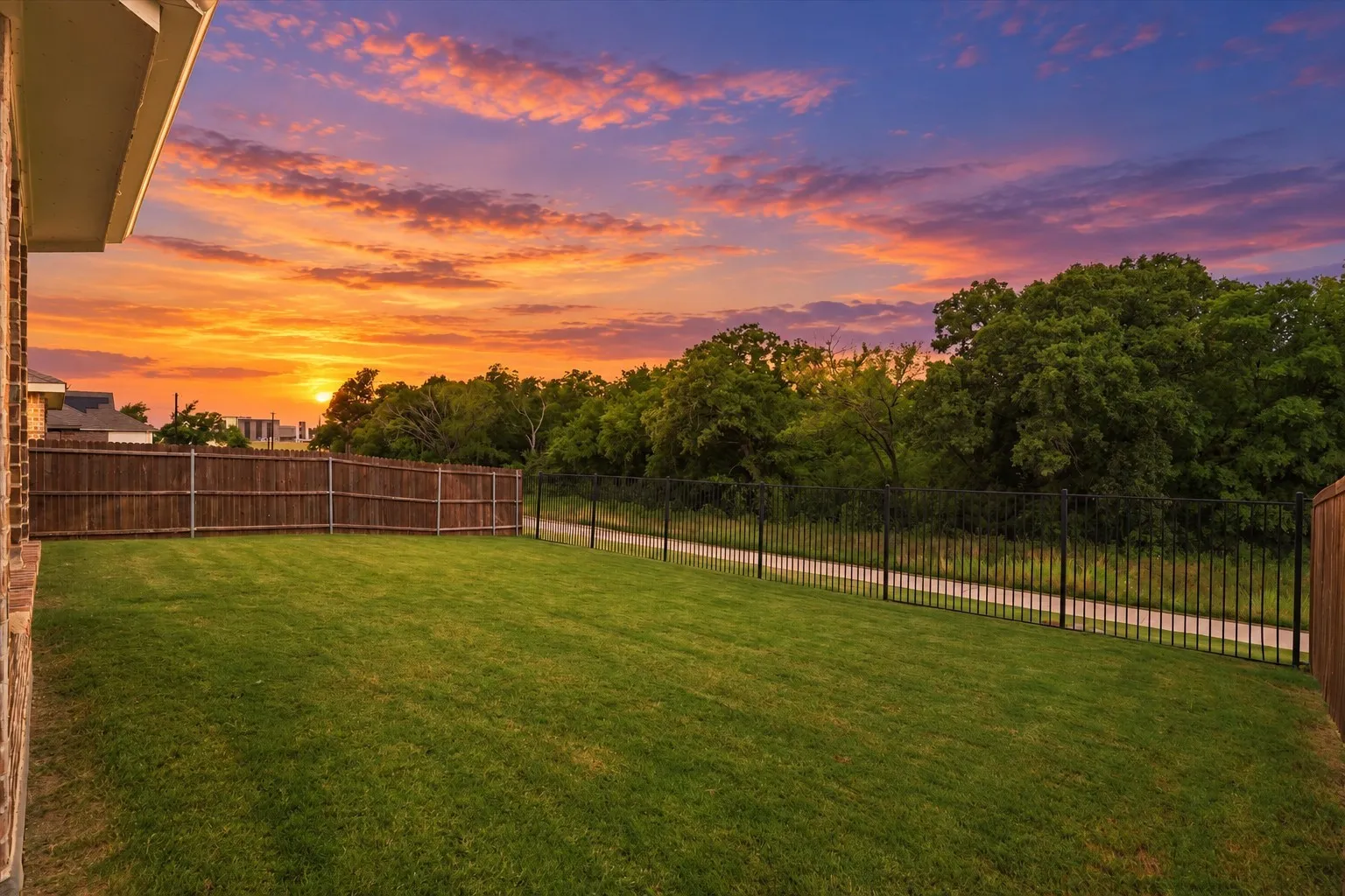 Enjoy sunset views in your new back yard backing to the nature preserve!  Virtually enhanced sunset views.