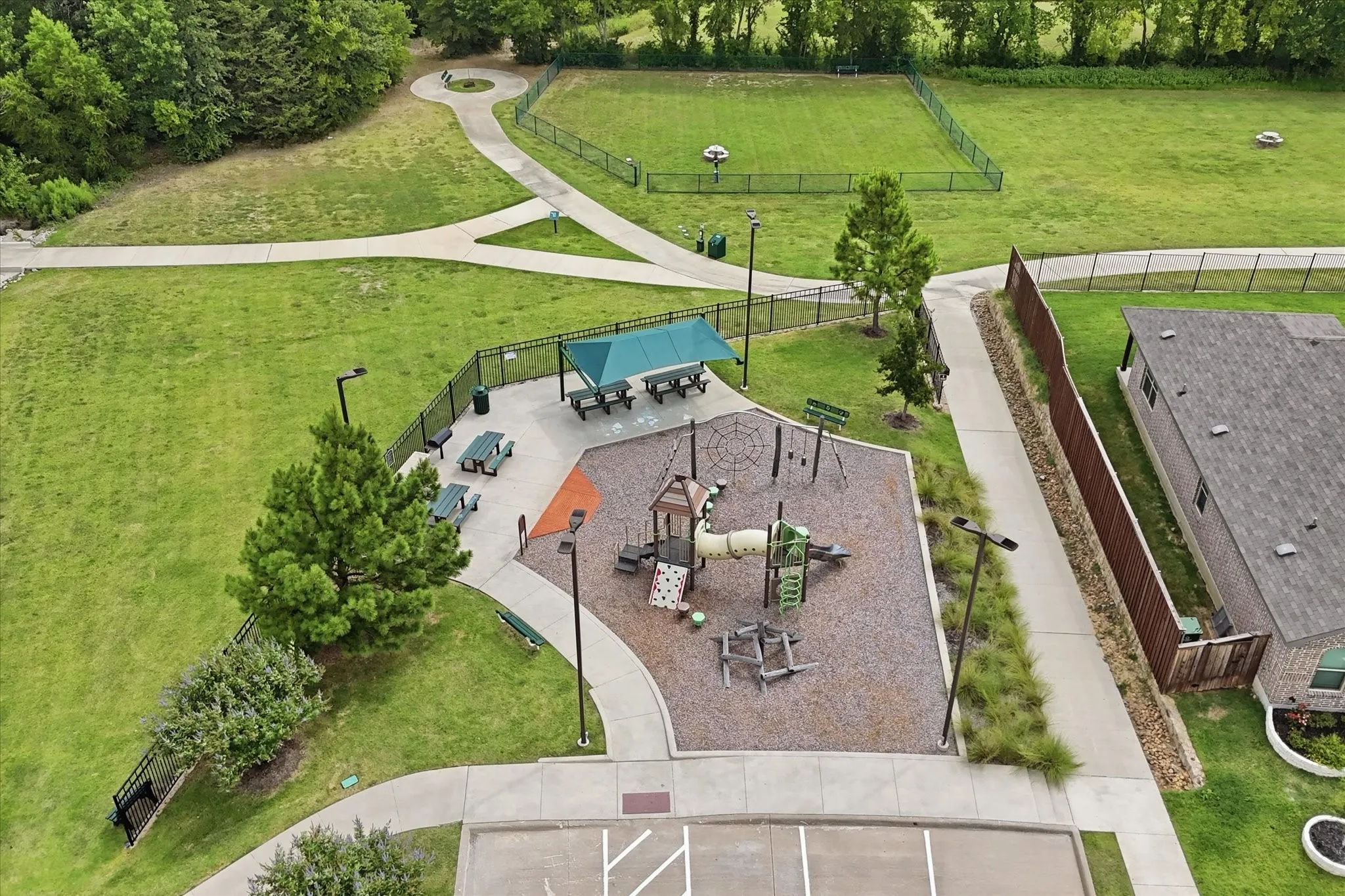 Aerial view of the community picnic area and playgorund.  Dog park too.