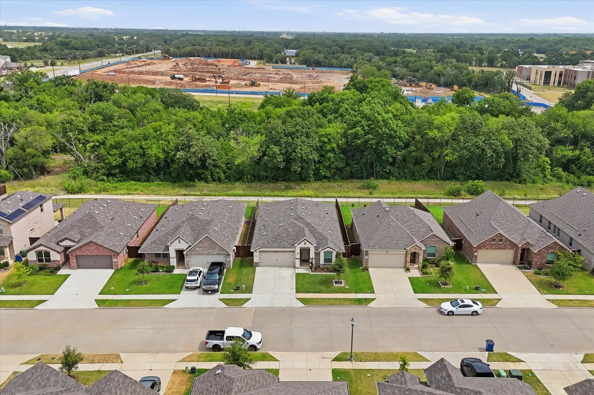 Aerial view of the home backing to the nature preserve.