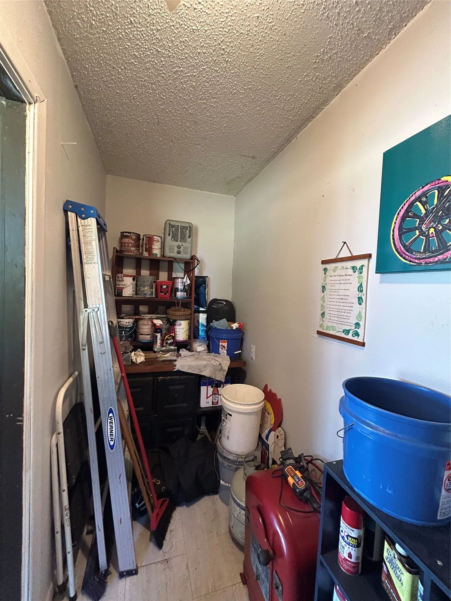 Inside the laundry room to the left