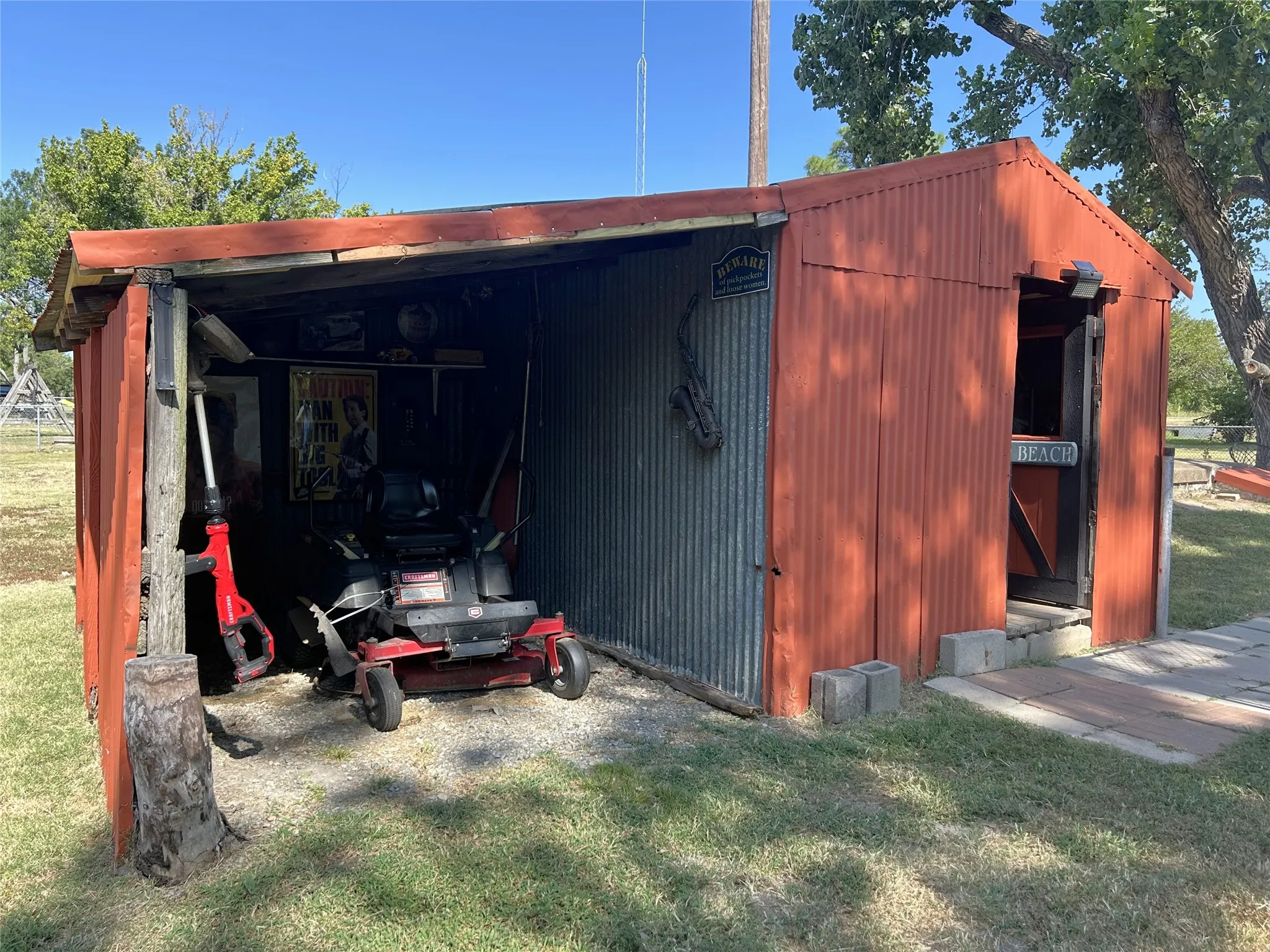 Room for your mower beside the shed.