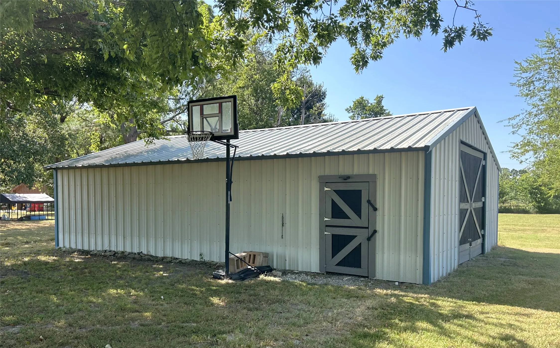 24 X 37 shop with walk through Dutch door and large doors for equipment