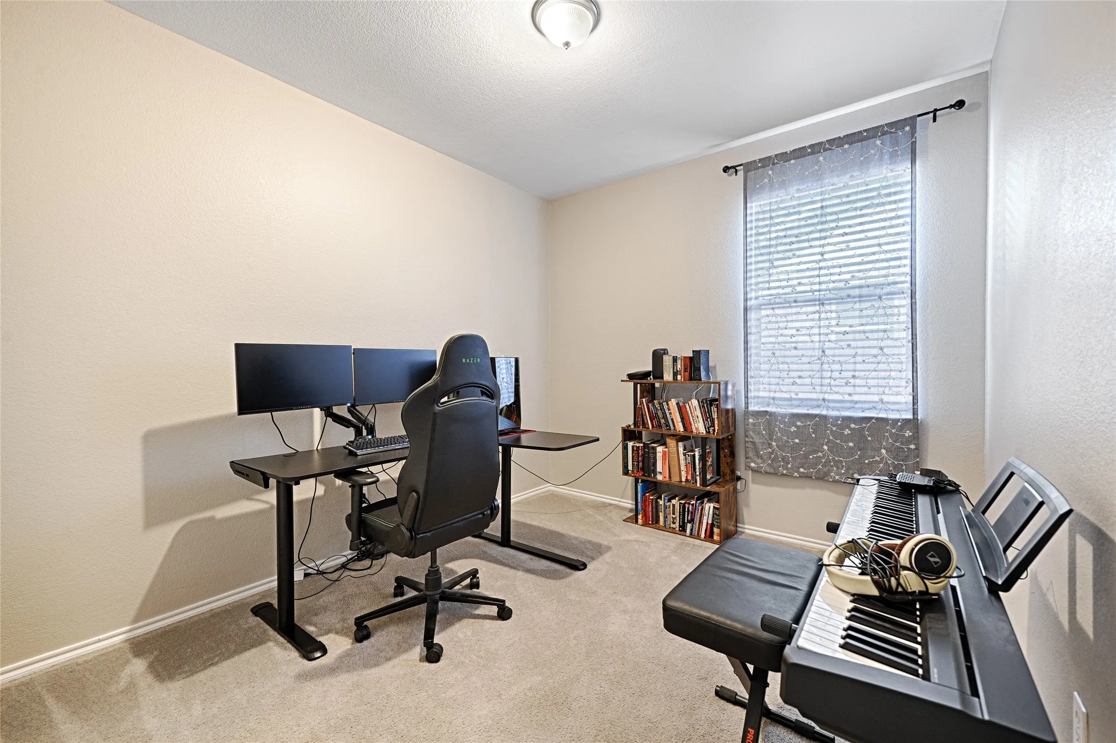 The third bedroom is also being used as office space but has plenty of room for a bed and furniture.