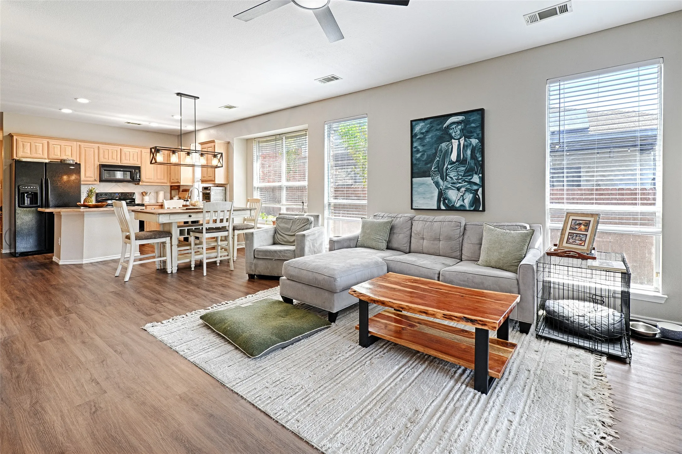 Angle from in front of the fireplace, showing how open the floor plan is.