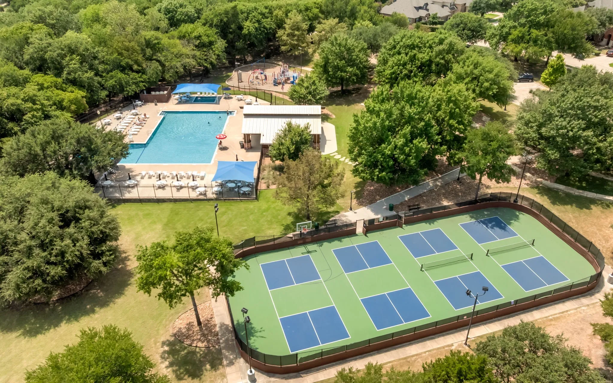 Neighborhood park with pool, playground and courts is close by.