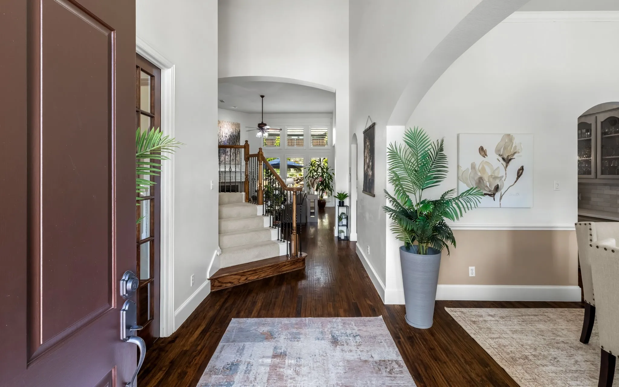 Beautiful entry with warm hardwoods, soaring ceilings and the perfect layout.