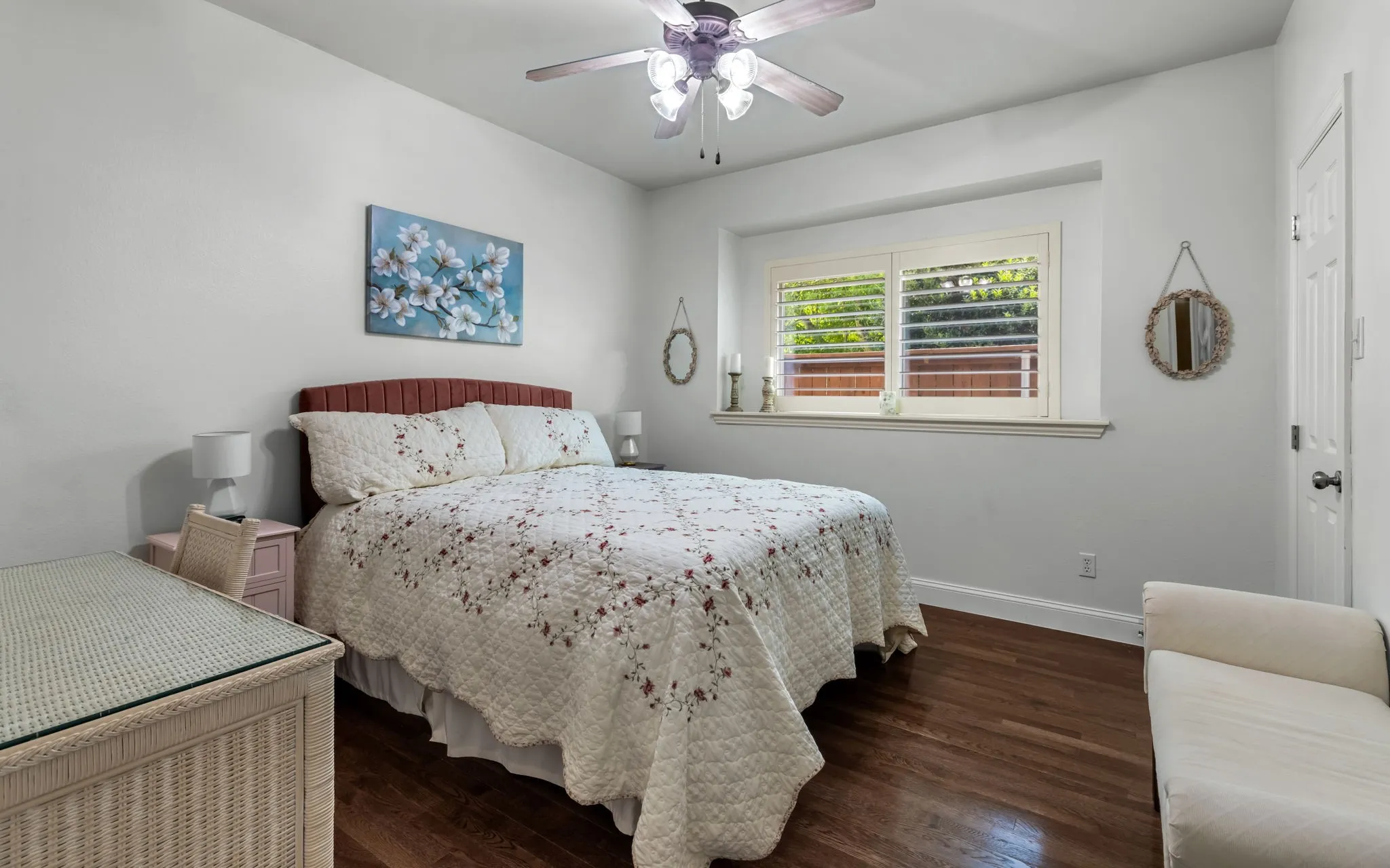 Downstairs bedroom is tucked away from the rest of the home for added privacy and a full bath is accessible.