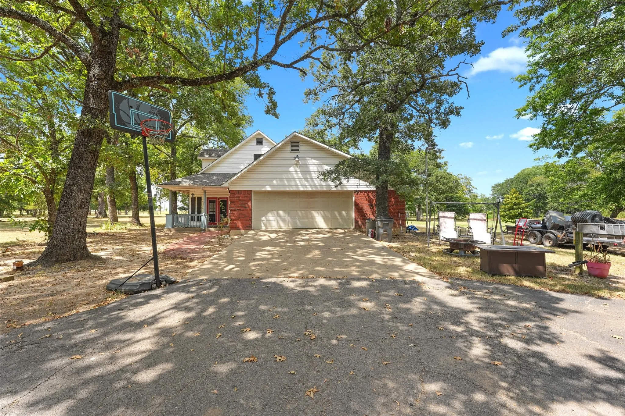 Brick and siding exterior with a two-car garage