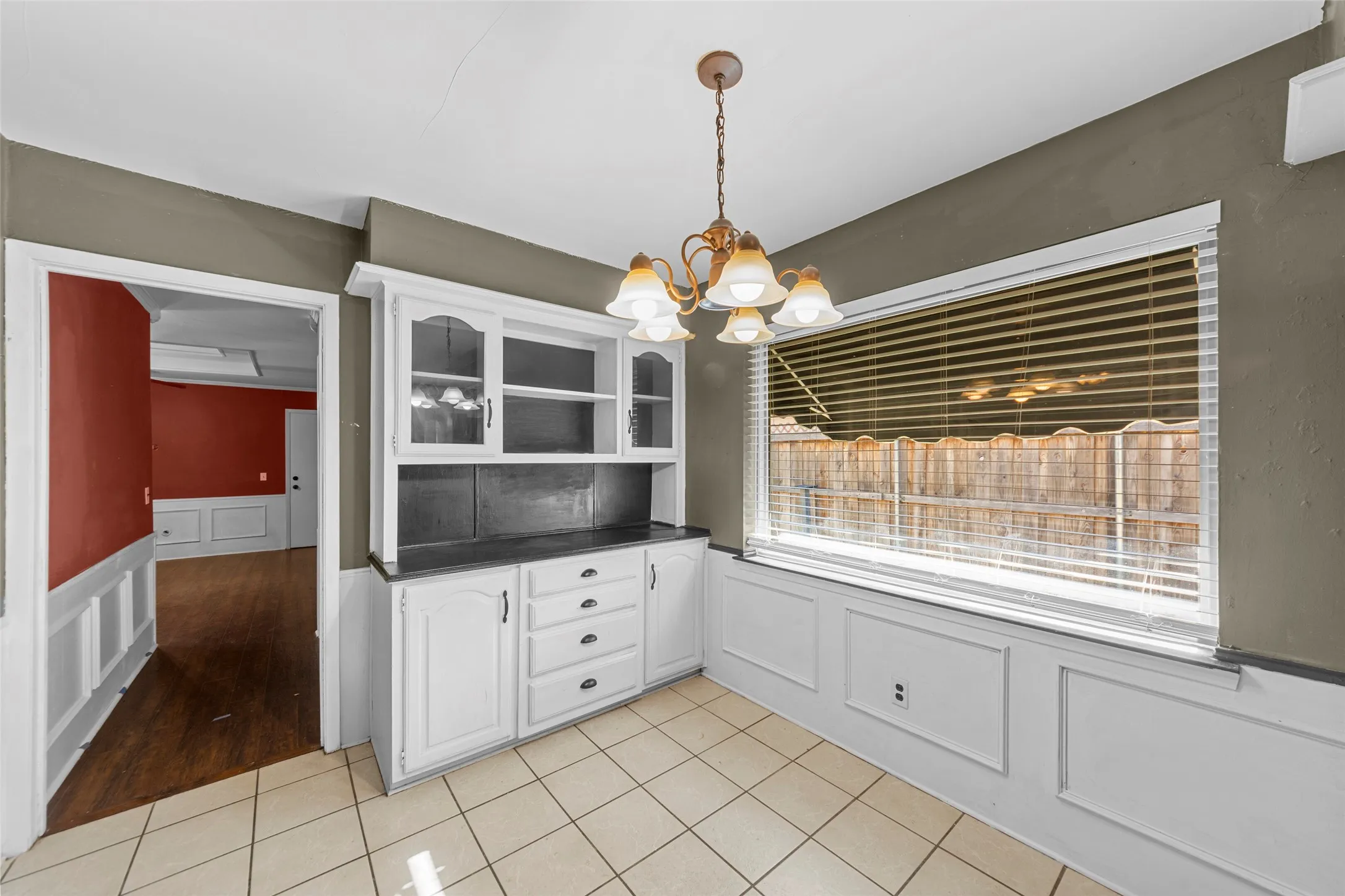 Built-in hutch with upper glass-front cabinets and lower drawers