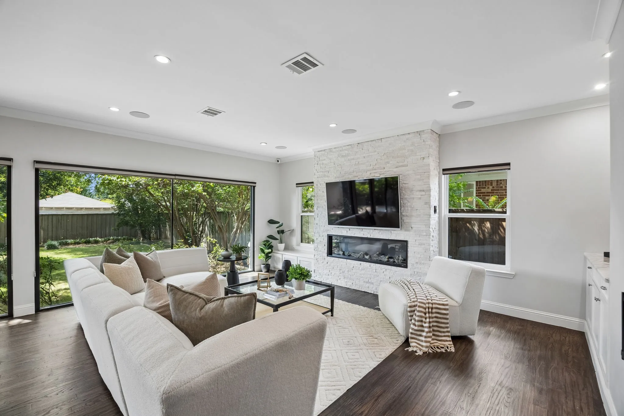 Living area featuring a gas fireplace.