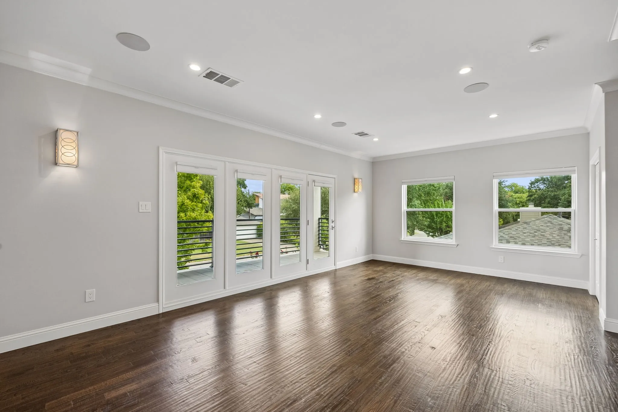 Upstairs living area with balcony.