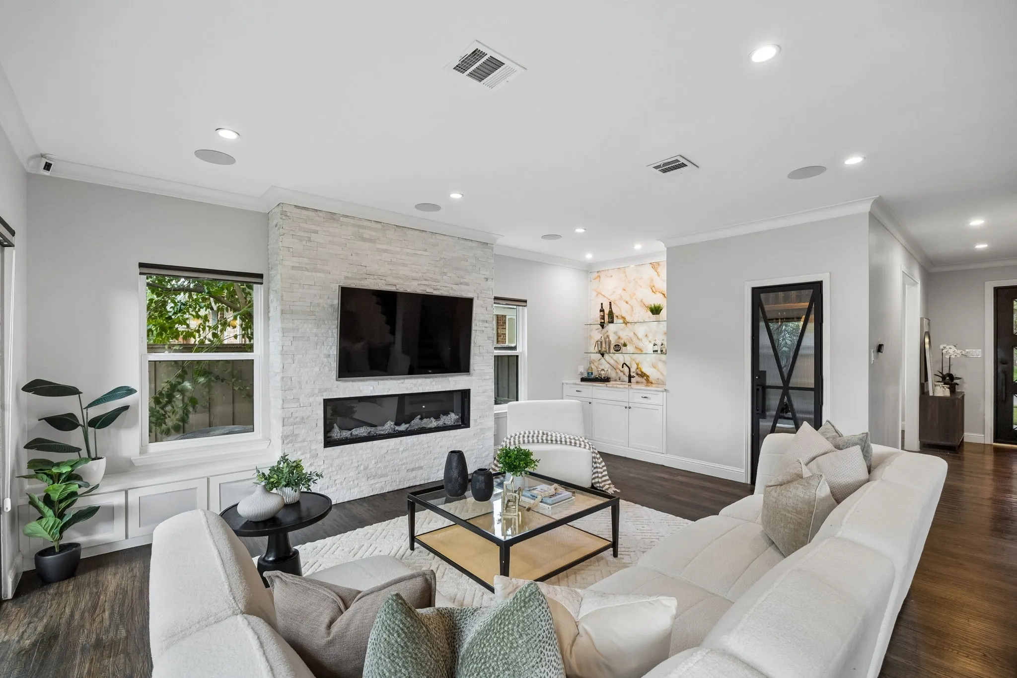 Open concept living area with wetbar.