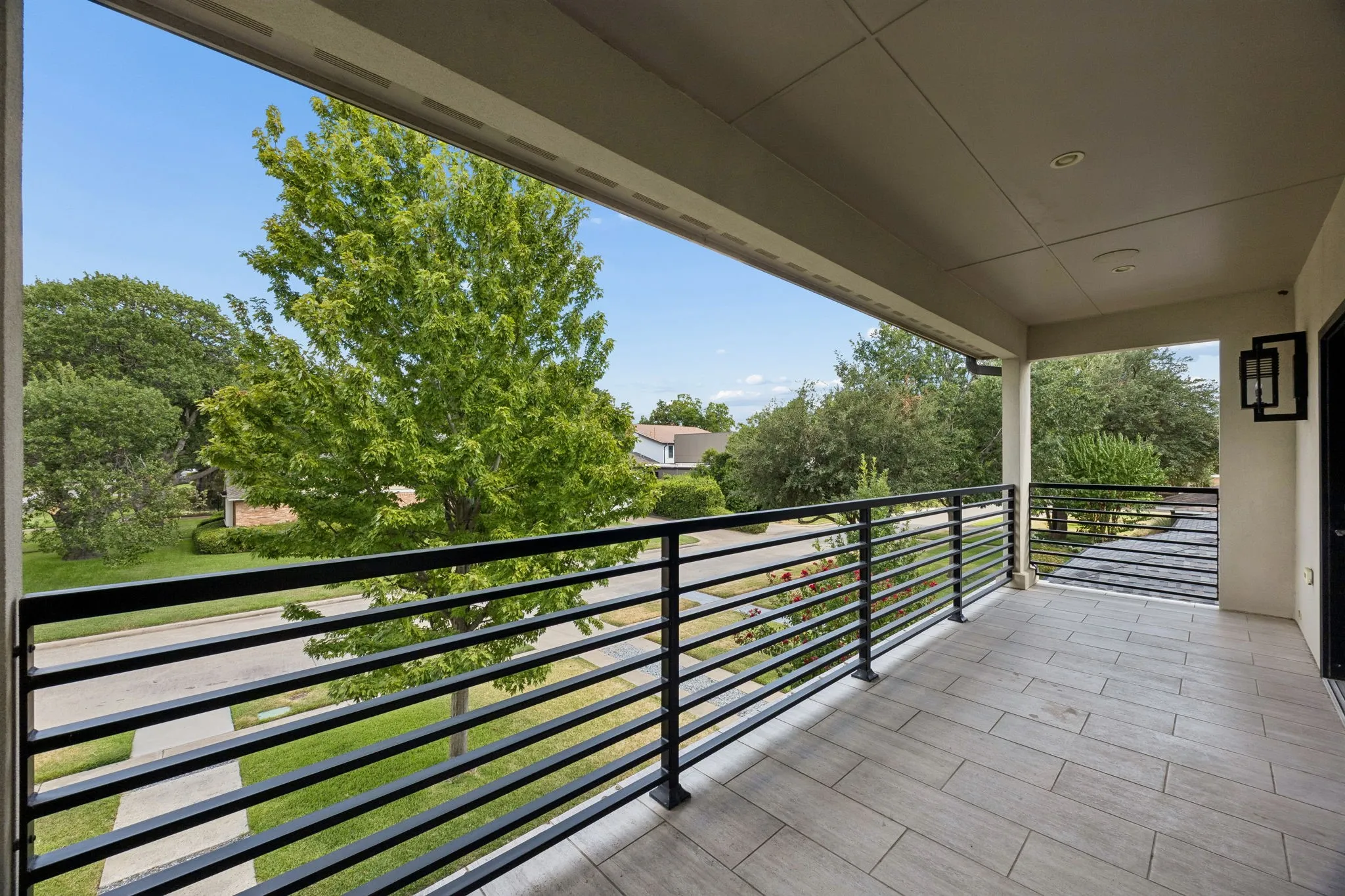 Balcony off of the upstairs den that overlooks the front yard.