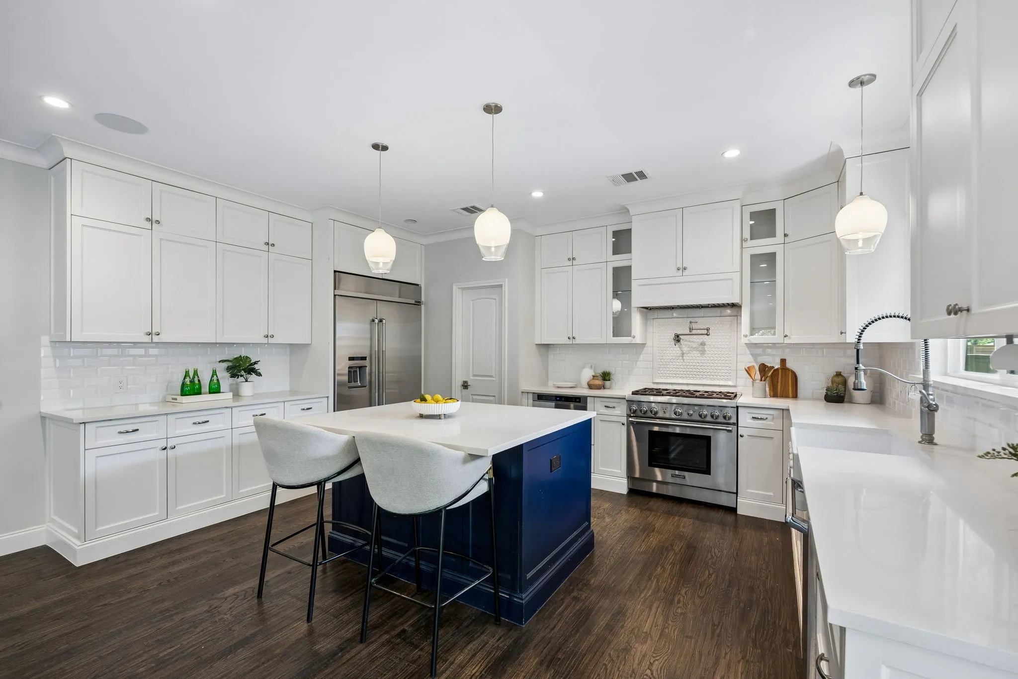 Large kitchen with tons of storage and walk in pantry.