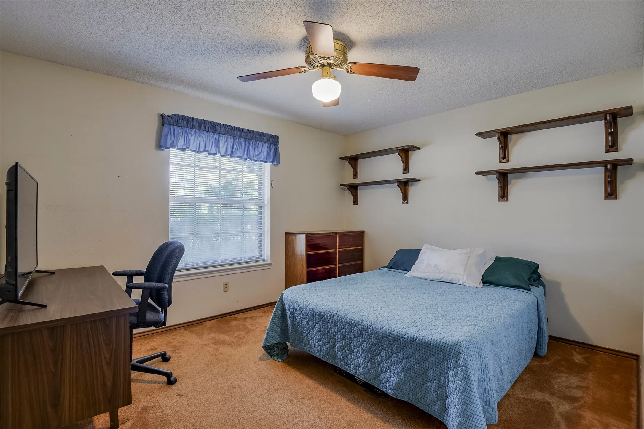 Both auxiliary bedrooms offer space and flexibility a desk and additional furnishing with room to spare.