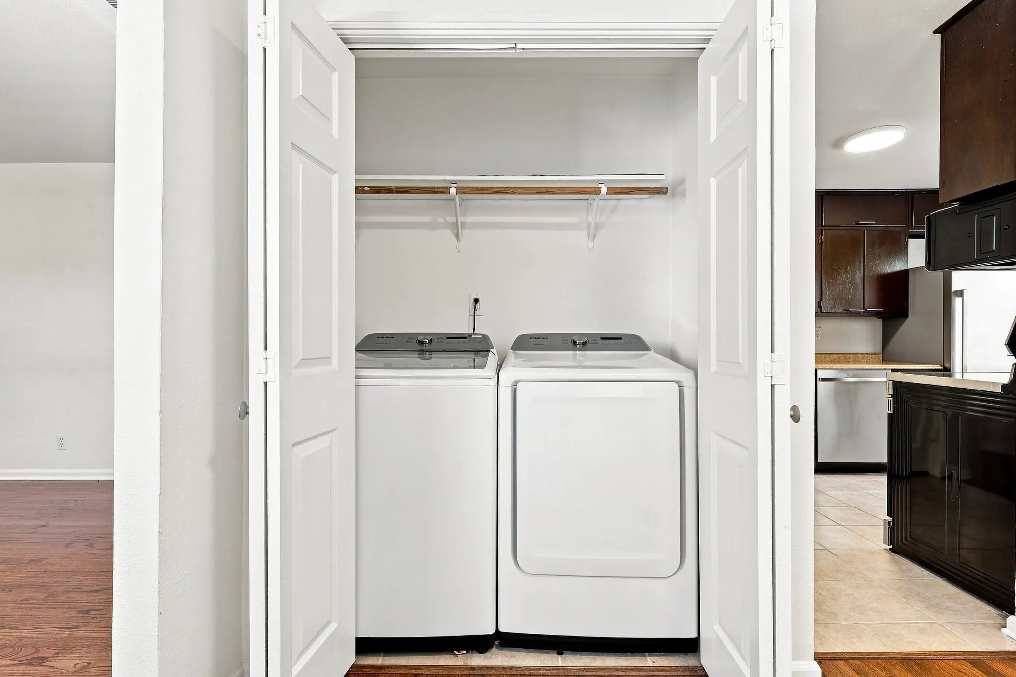 Includes full size washer and dryer.
