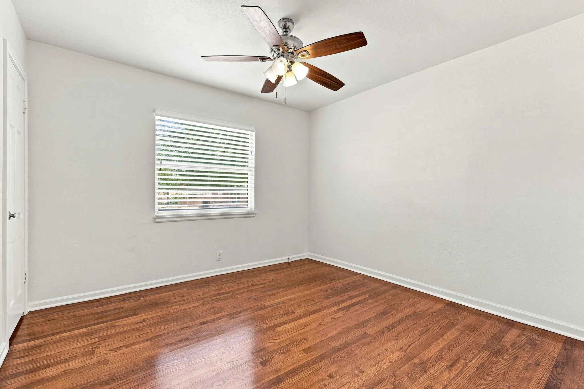 Primary Bedroom with ceiling fan.